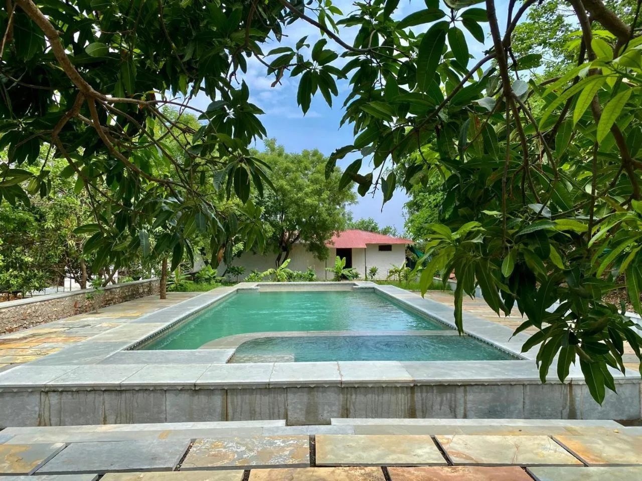 Swimming pool in Pangarh Lake Retreat