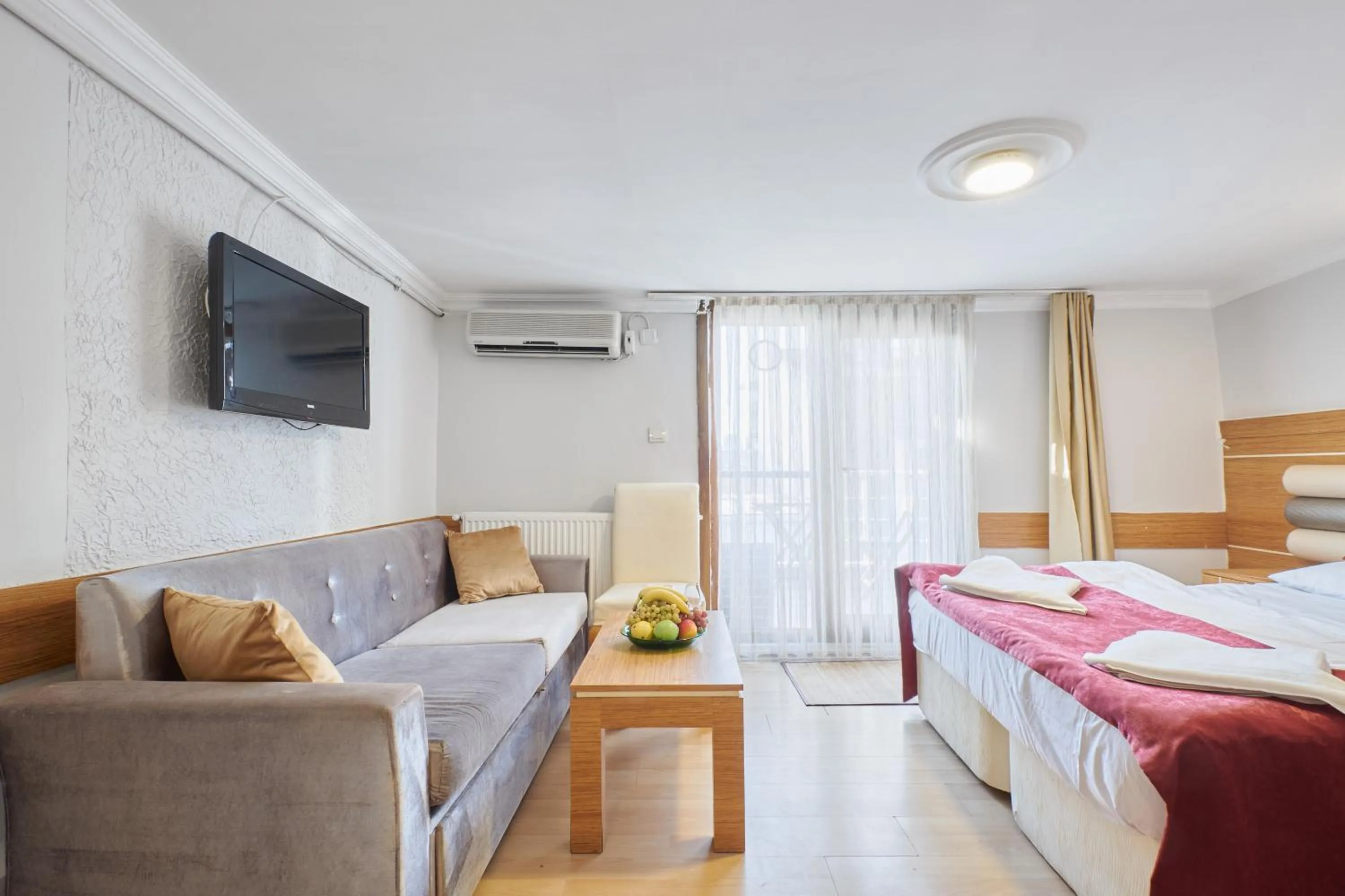 TV and multimedia, Bed in Central Suites Taksim