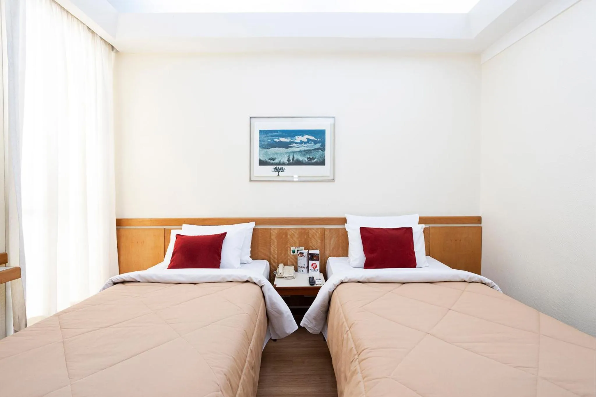 Bed in Nikkey Palace Hotel