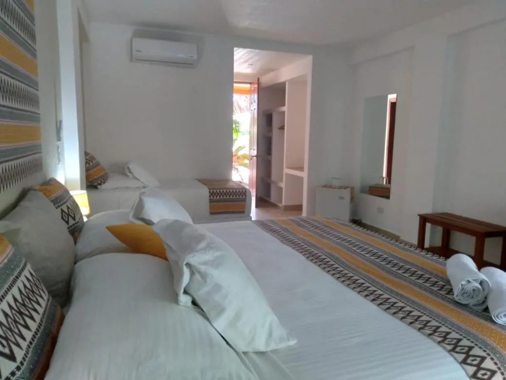 Bed in Montelaguna Boutique Hotel