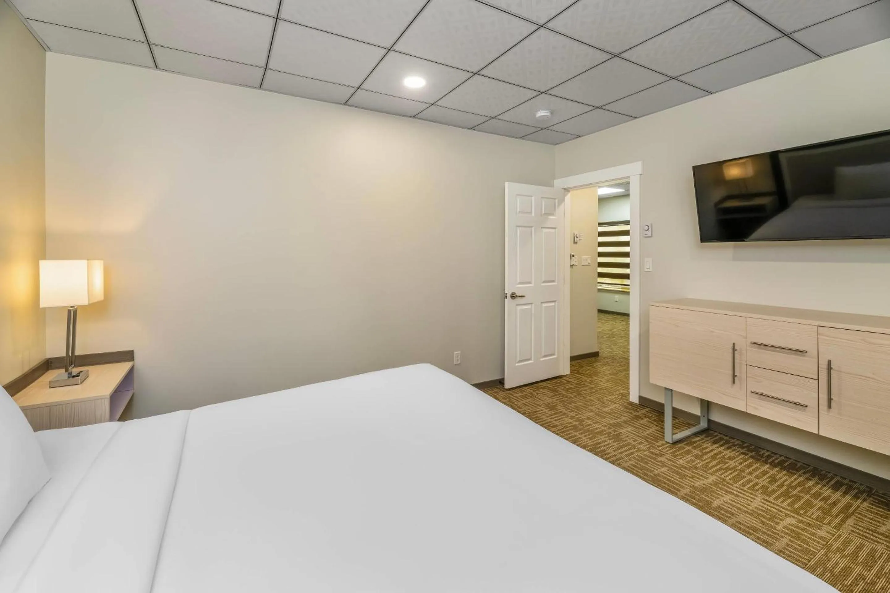 Bedroom, Bed in Quality Inn Sunshine Suites