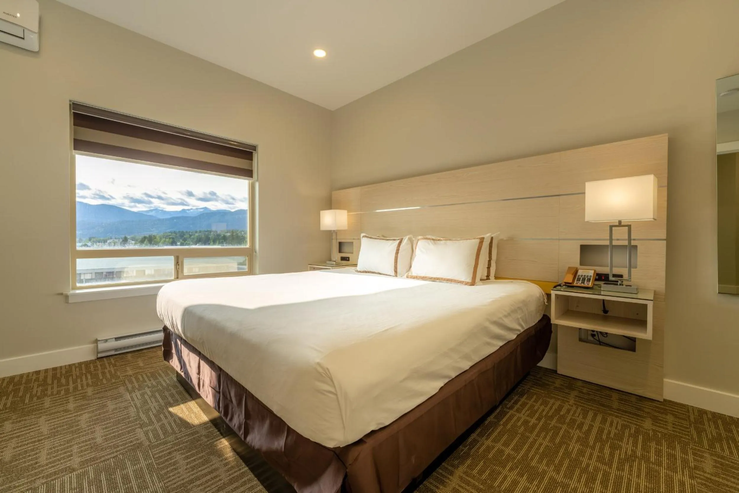 Bed in Quality Inn Sunshine Suites