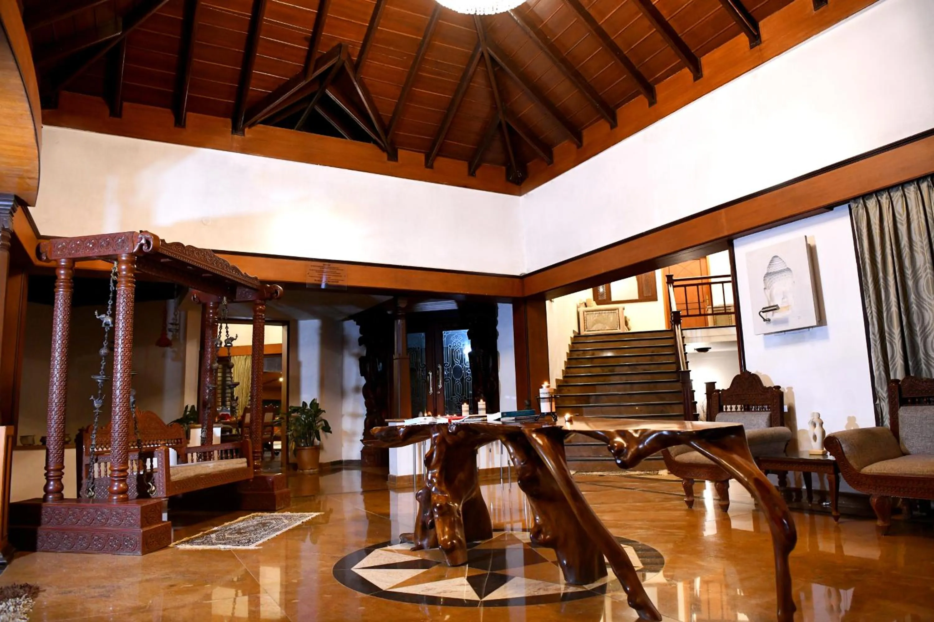 Communal lounge/ TV room in Unlock By Goldfinch Sakaleshpur