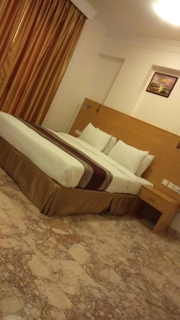 Bed in Al Reef Hotel