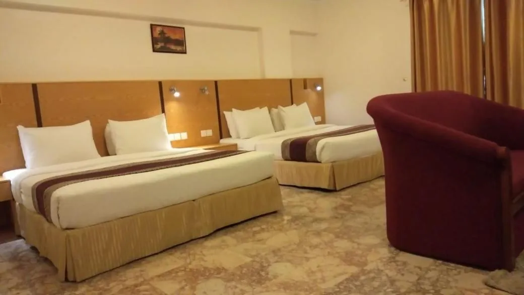 Bed in Al Reef Hotel