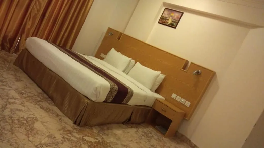 Bed in Al Reef Hotel