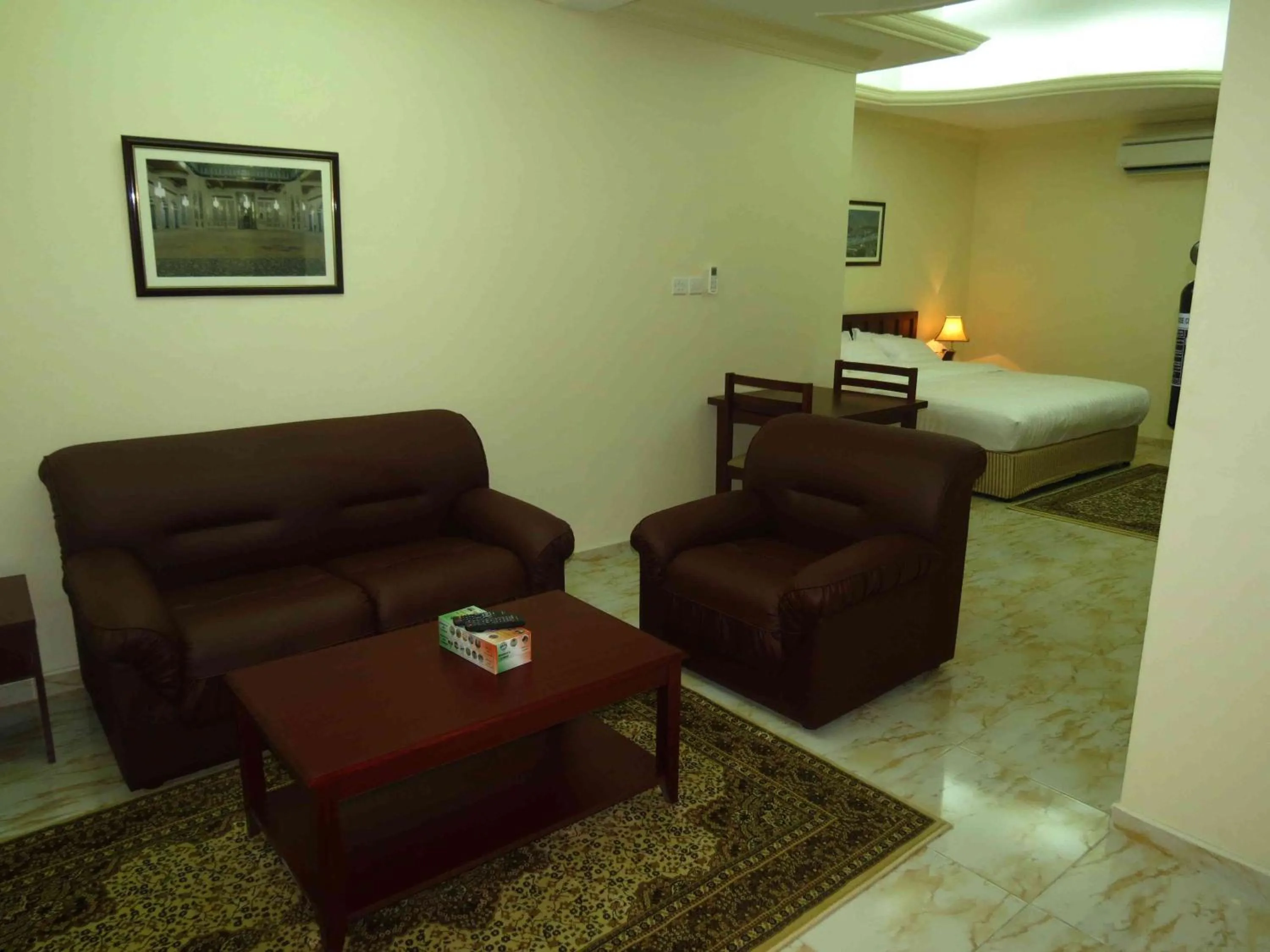 Living room, Bed in Al Ferdous Hotel Apartments
