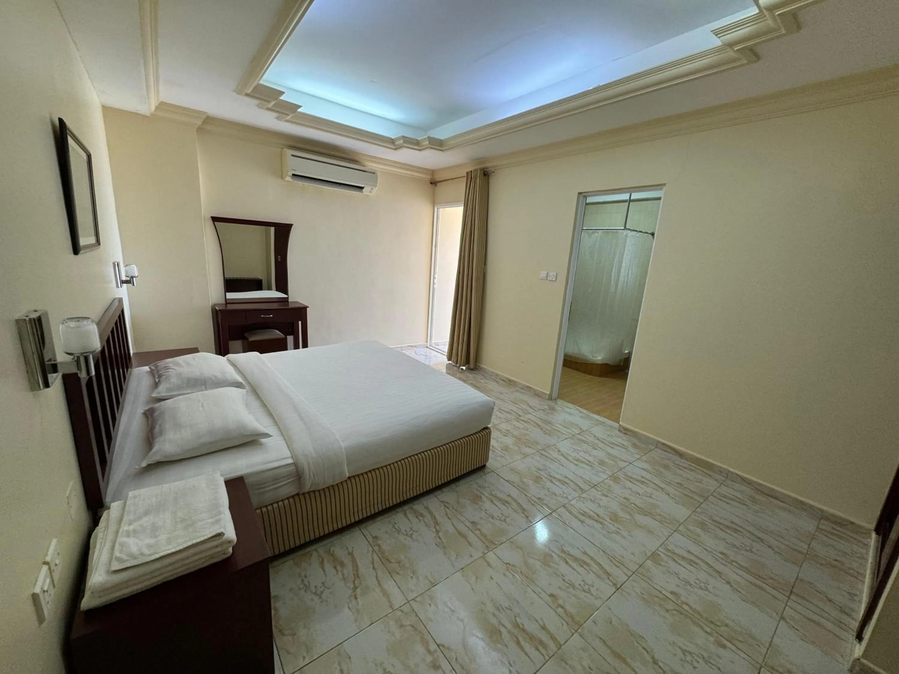 Bed in Al Ferdous Hotel Apartments