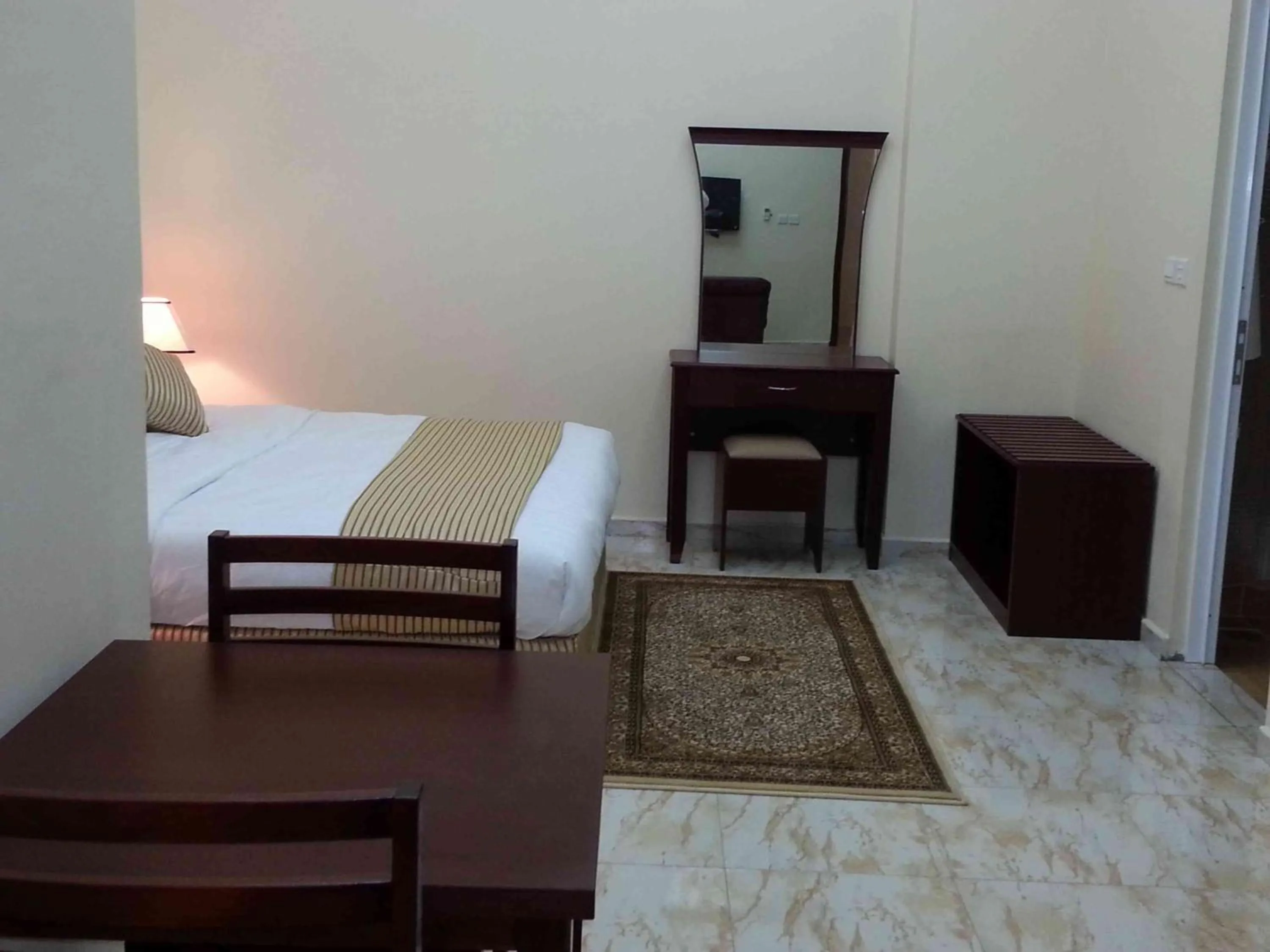 Bed in Al Ferdous Hotel Apartments