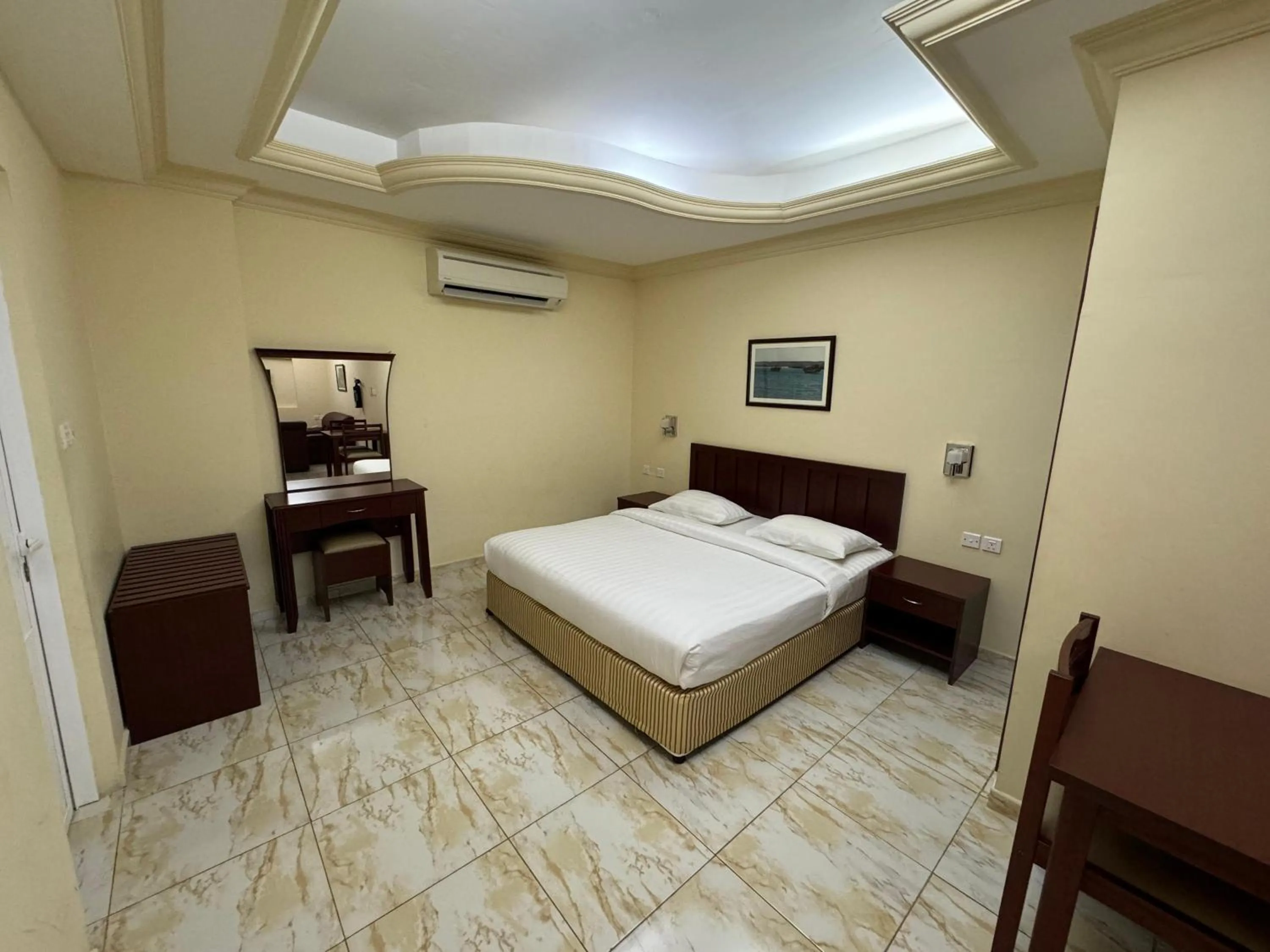 Bed in Al Ferdous Hotel Apartments