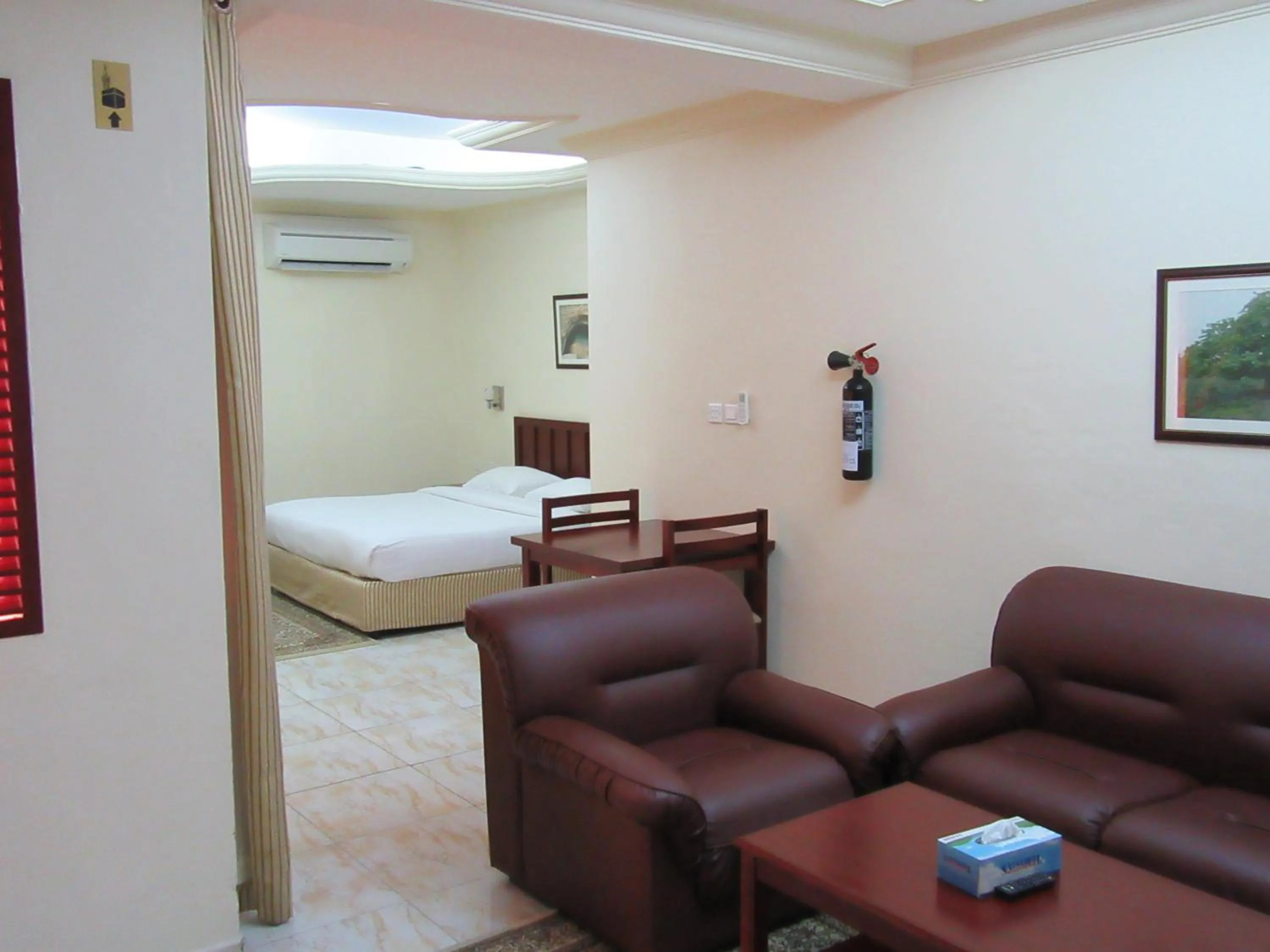 Bed in Al Ferdous Hotel Apartments