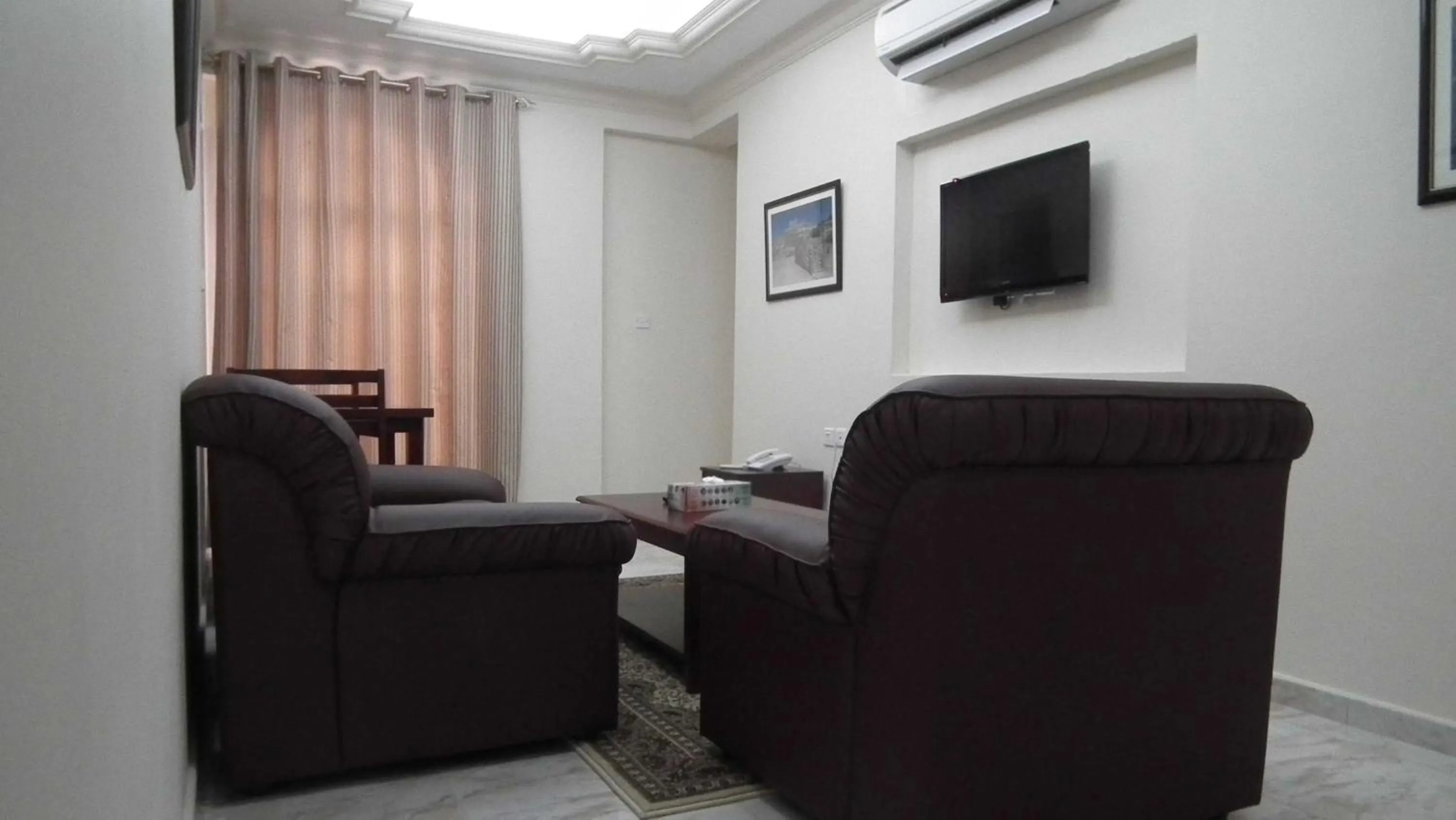 Living room in Al Ferdous Hotel Apartments