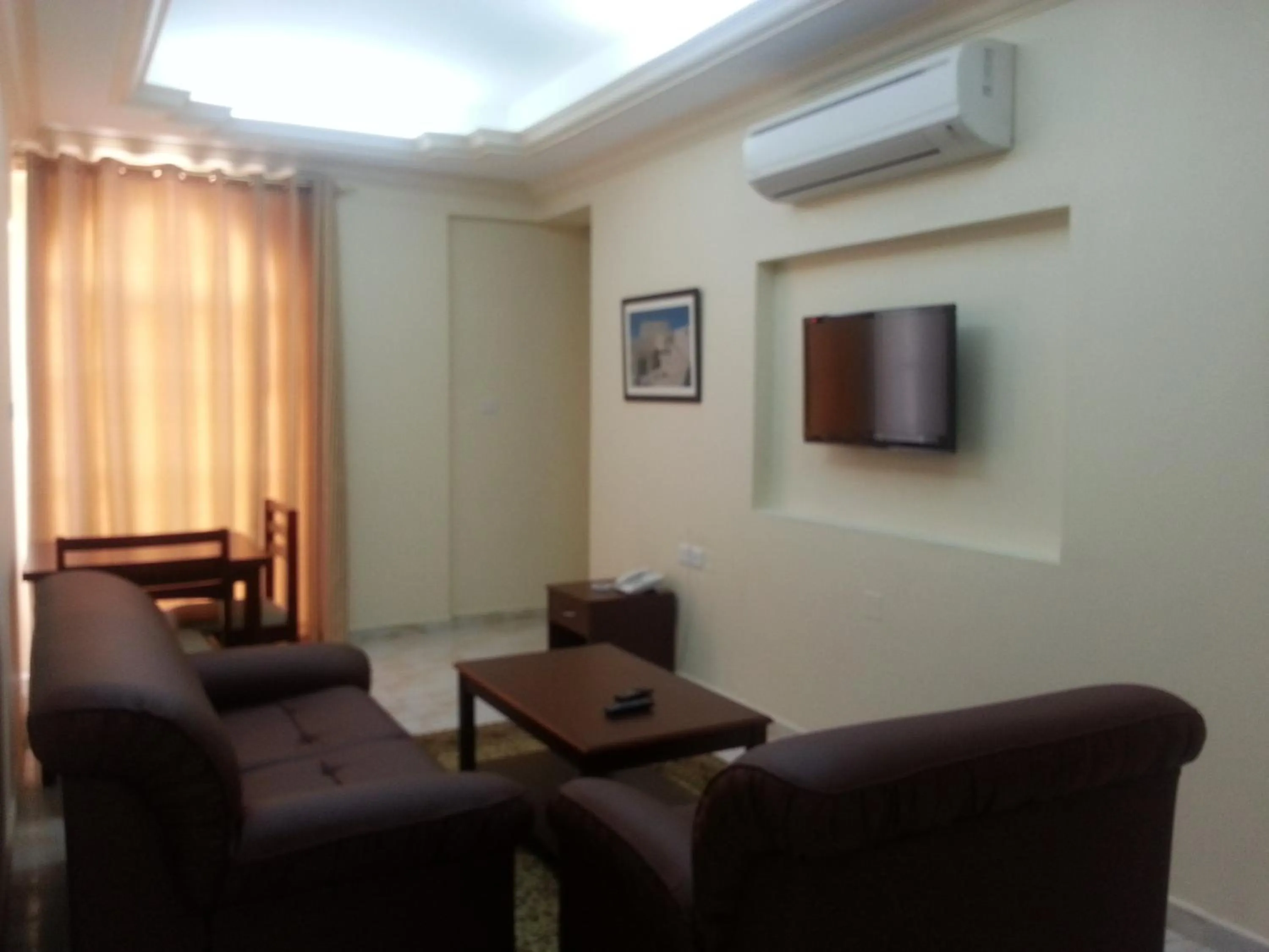 Living room in Al Ferdous Hotel Apartments