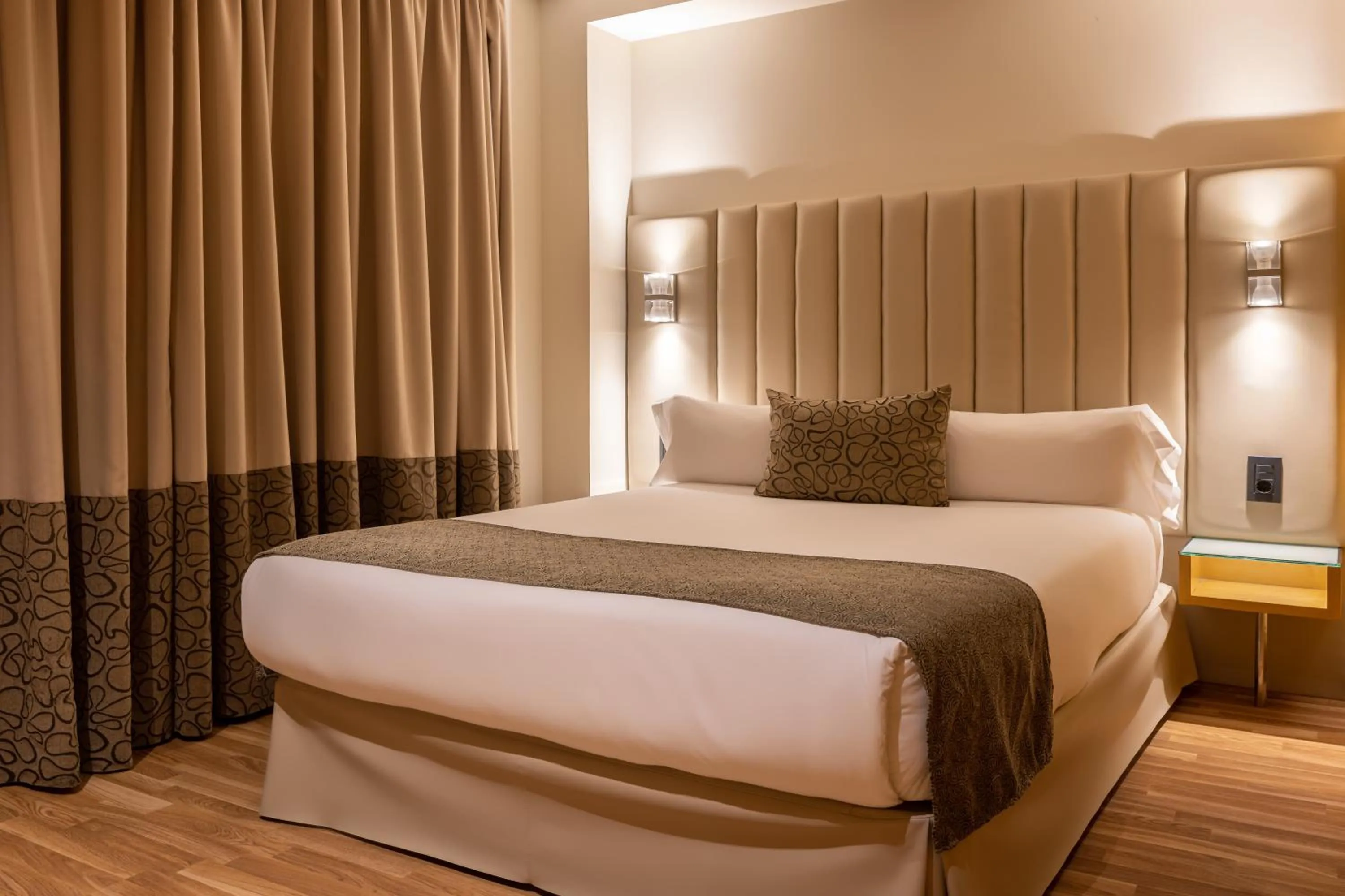 Bed in Hotel Sansi Barcelona