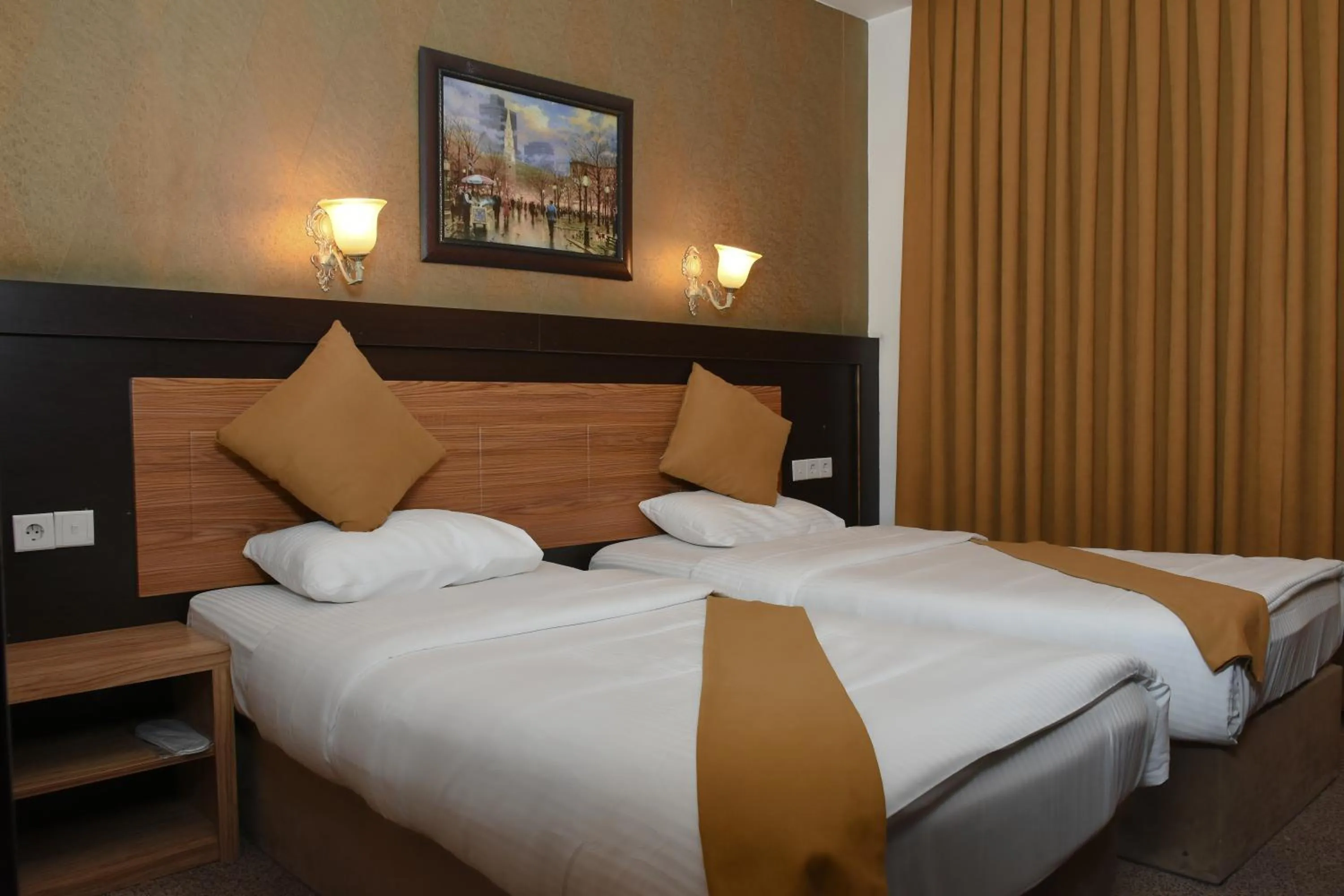 Bed in Asenappar Hotel