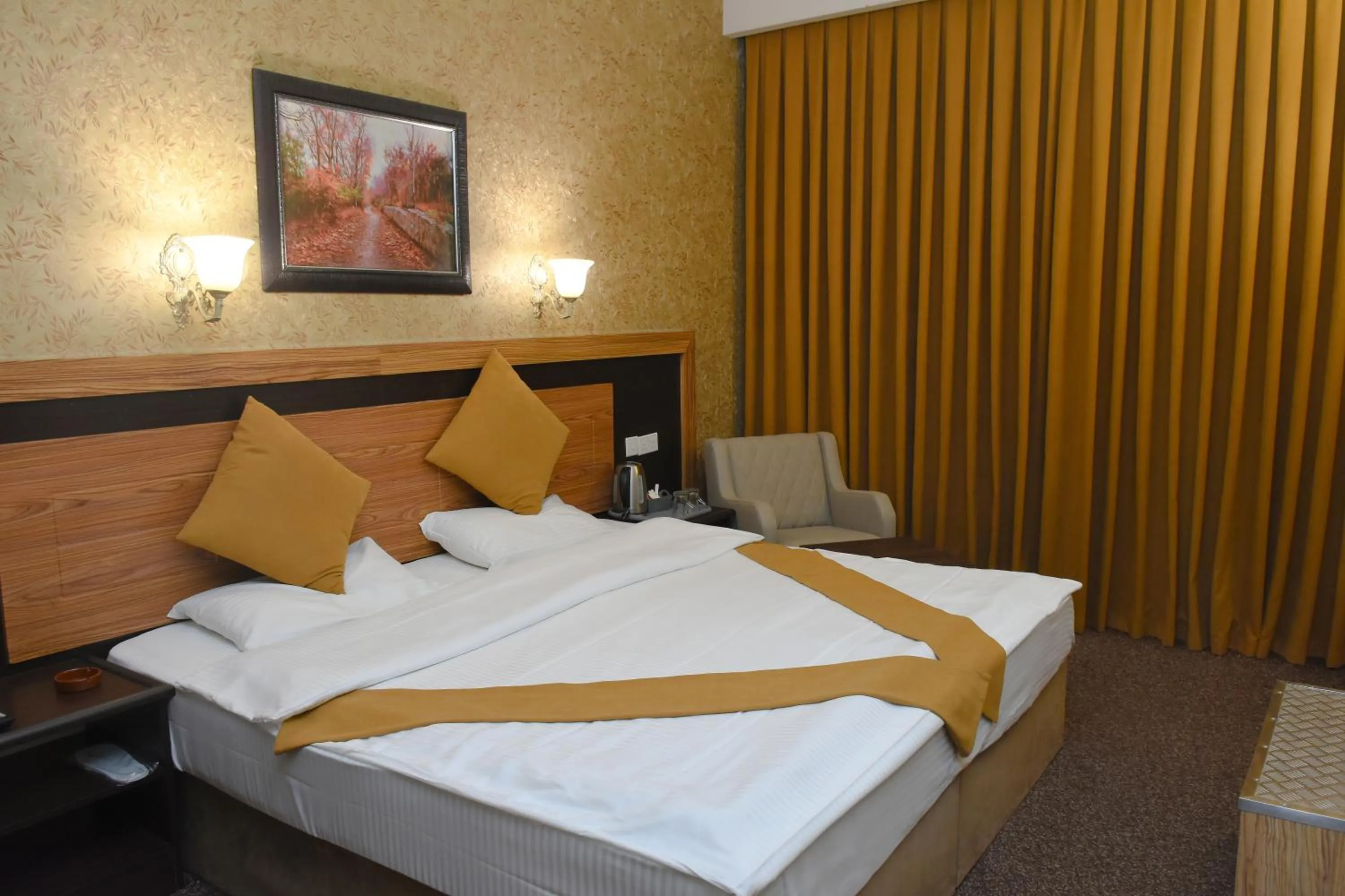 Bed in Asenappar Hotel