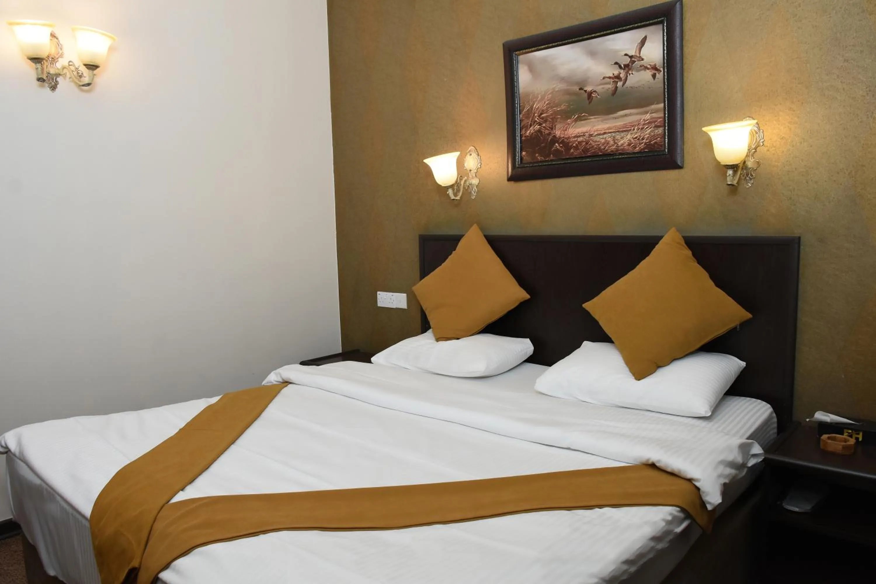 Bed in Asenappar Hotel