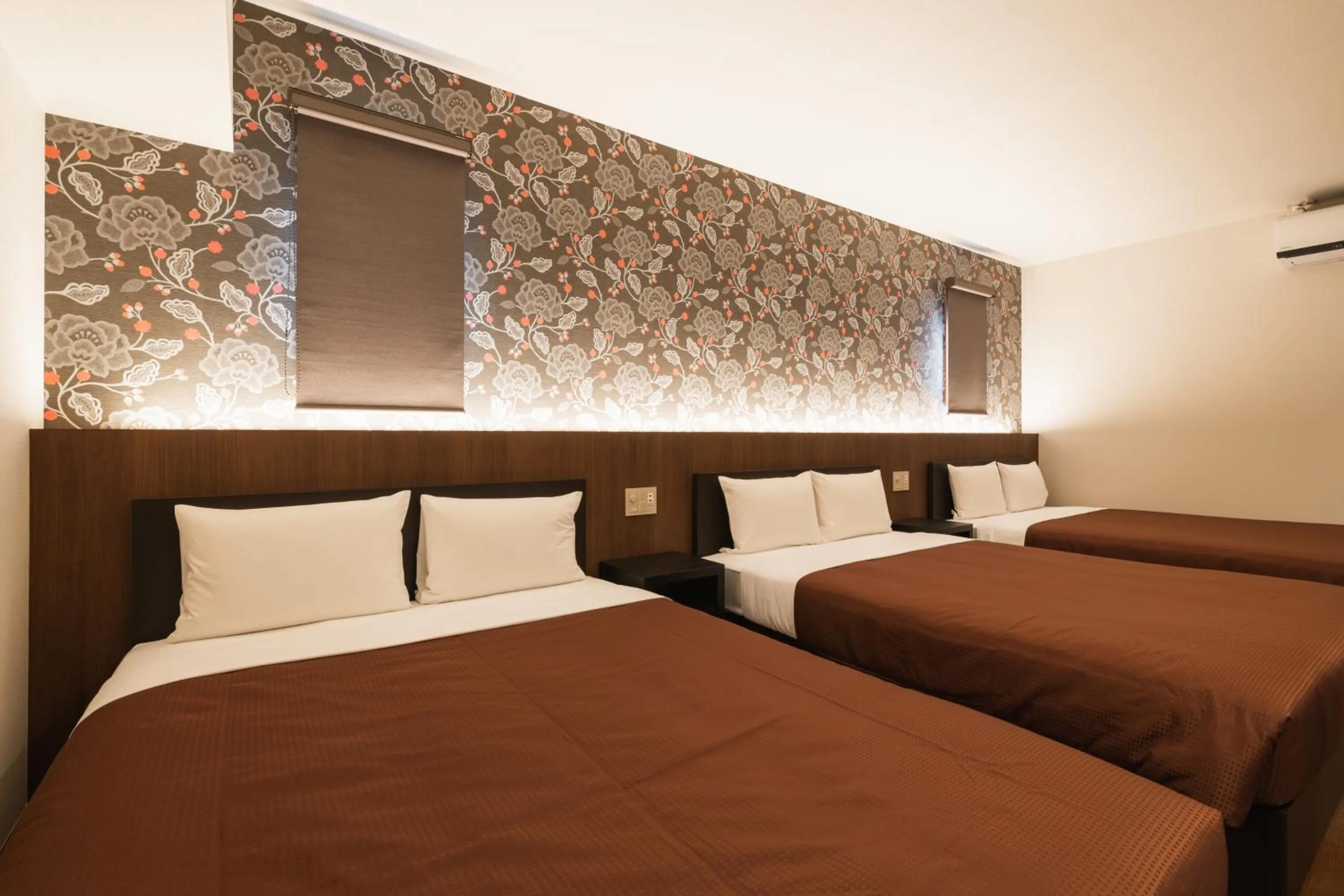 Bed in GRAND BASE Hakata Gofuku