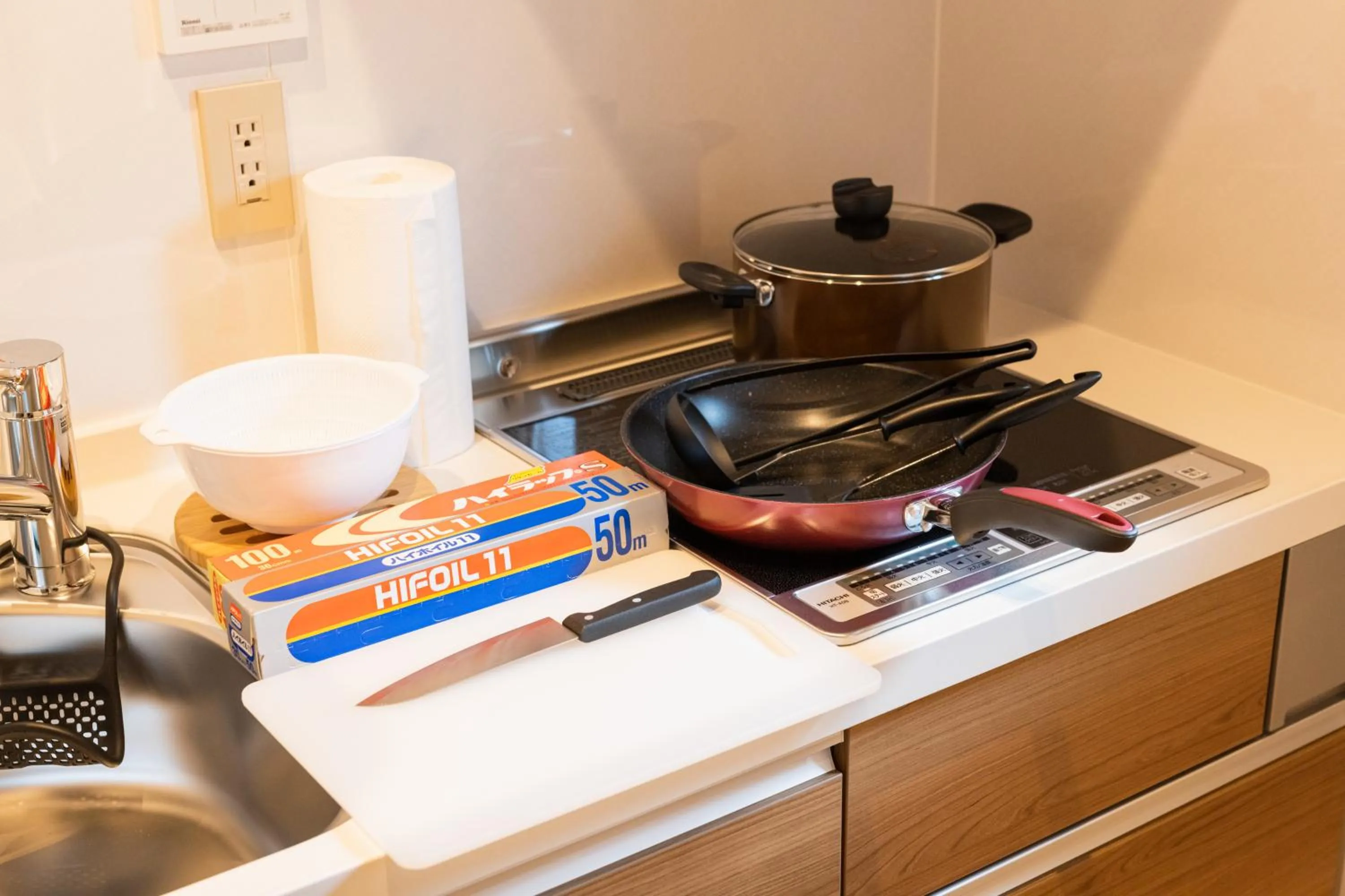 Kitchen or kitchenette in GRAND BASE Hakata Gofuku