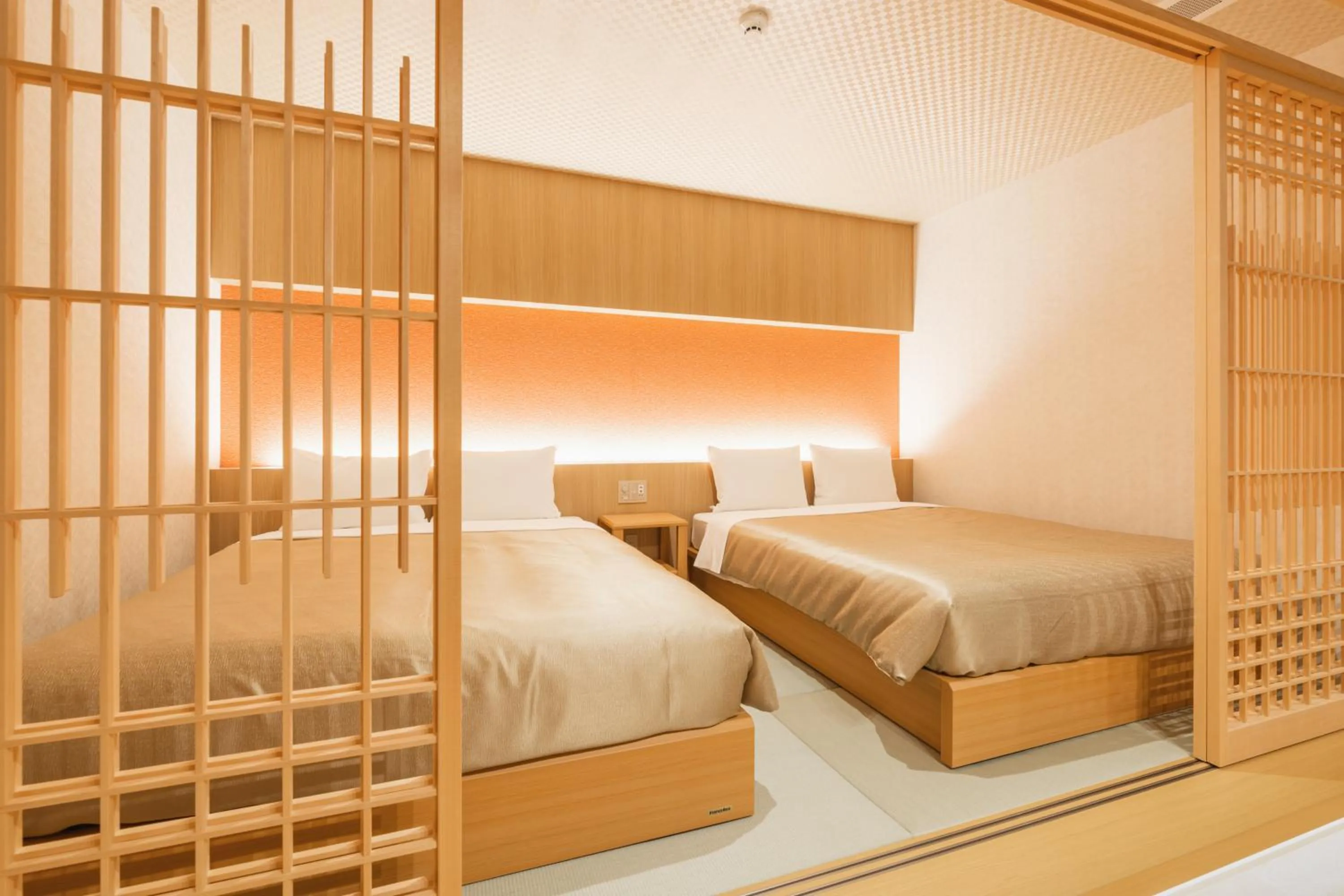 Bed in GRAND BASE Hakata Gofuku