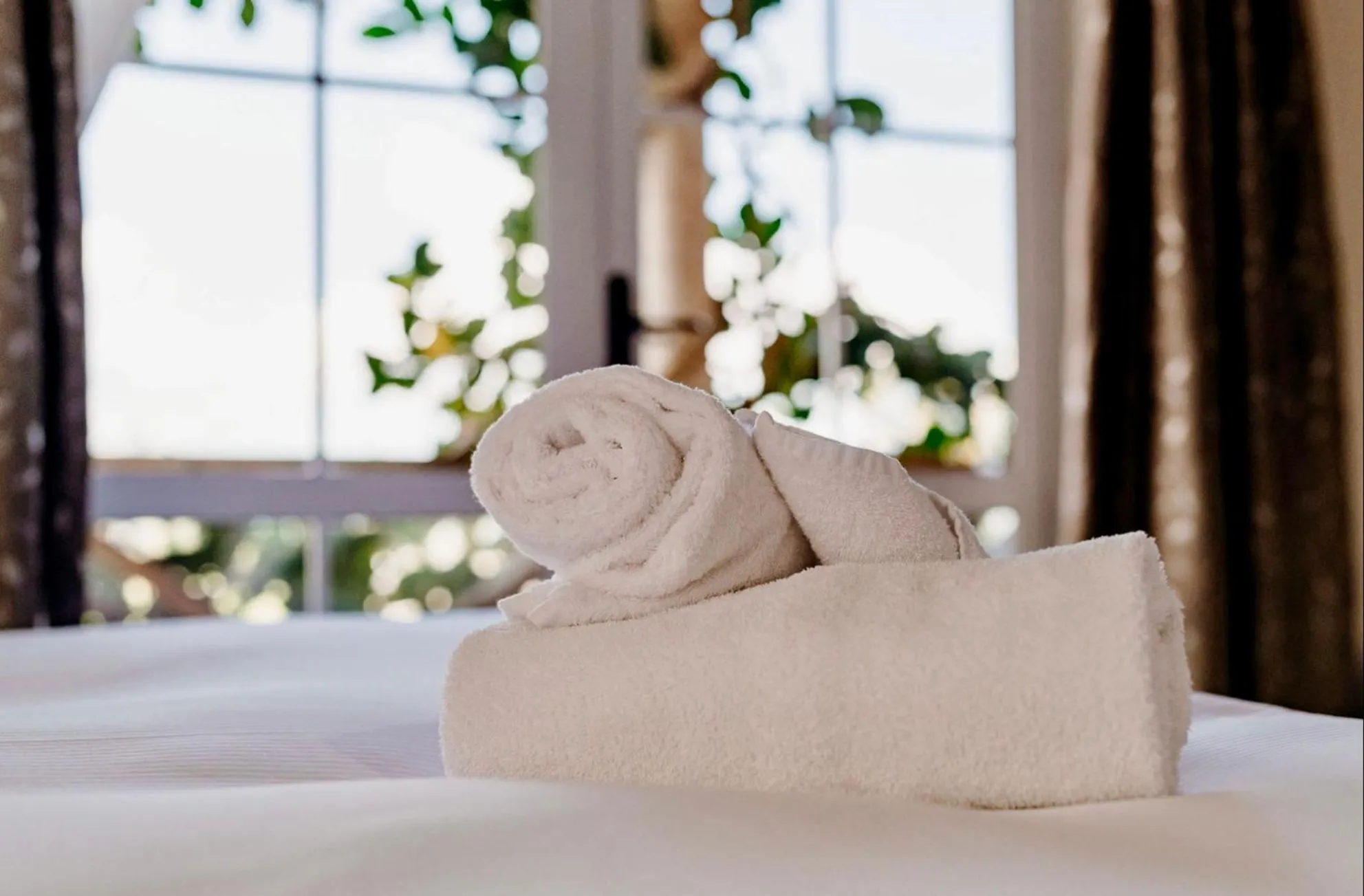 Bed in Anchor Lodge Motel