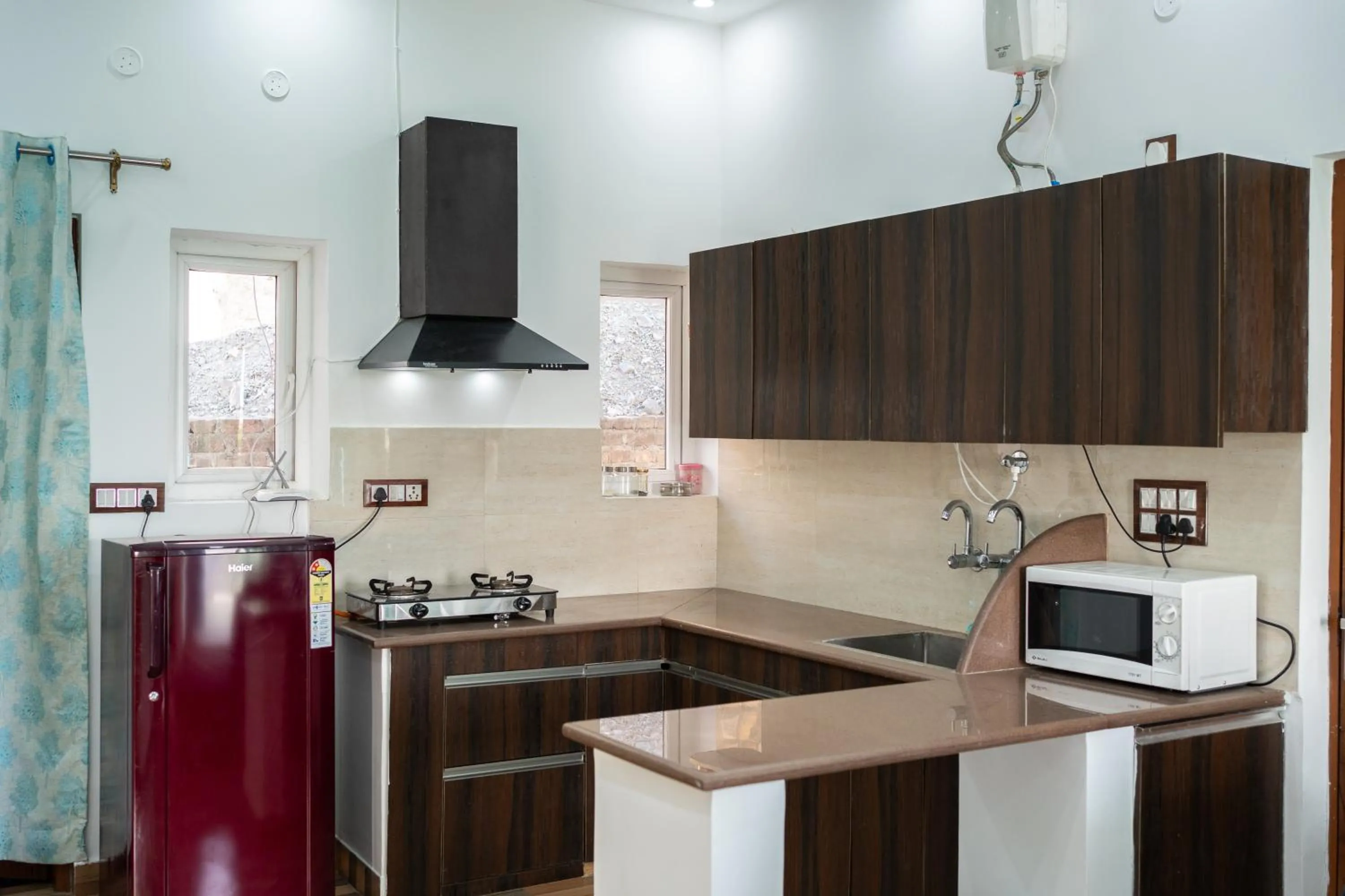 Kitchen or kitchenette in The Bougainvillea Retreat - A Luxury Private Pool Villa in Dehradun