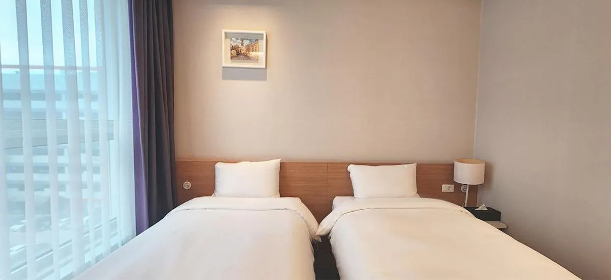 Bed in Grand City Hotel Changwon