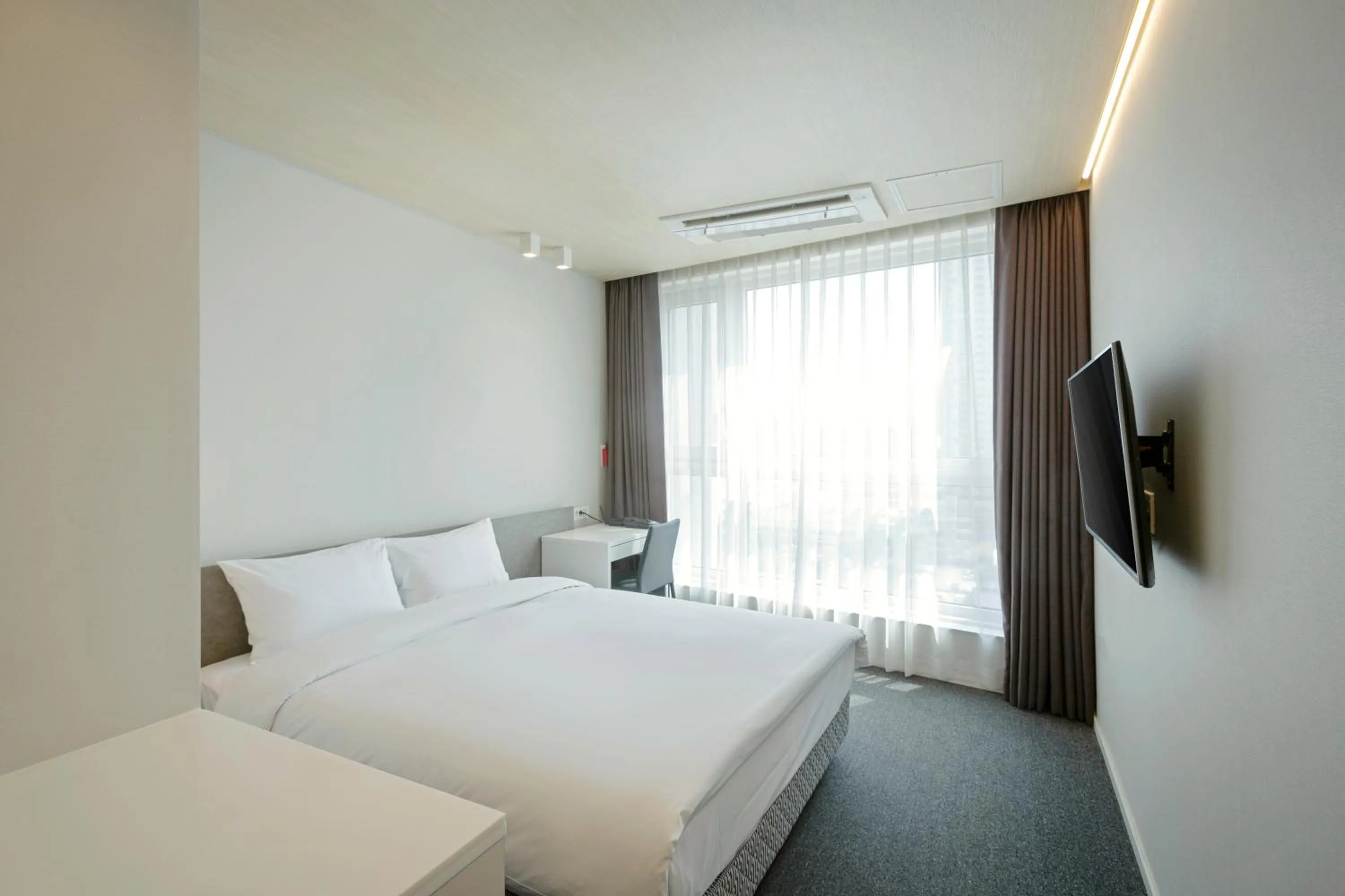 Bed in Grand City Hotel Changwon