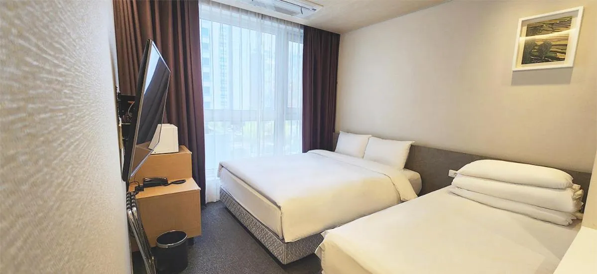 Bed in Grand City Hotel Changwon