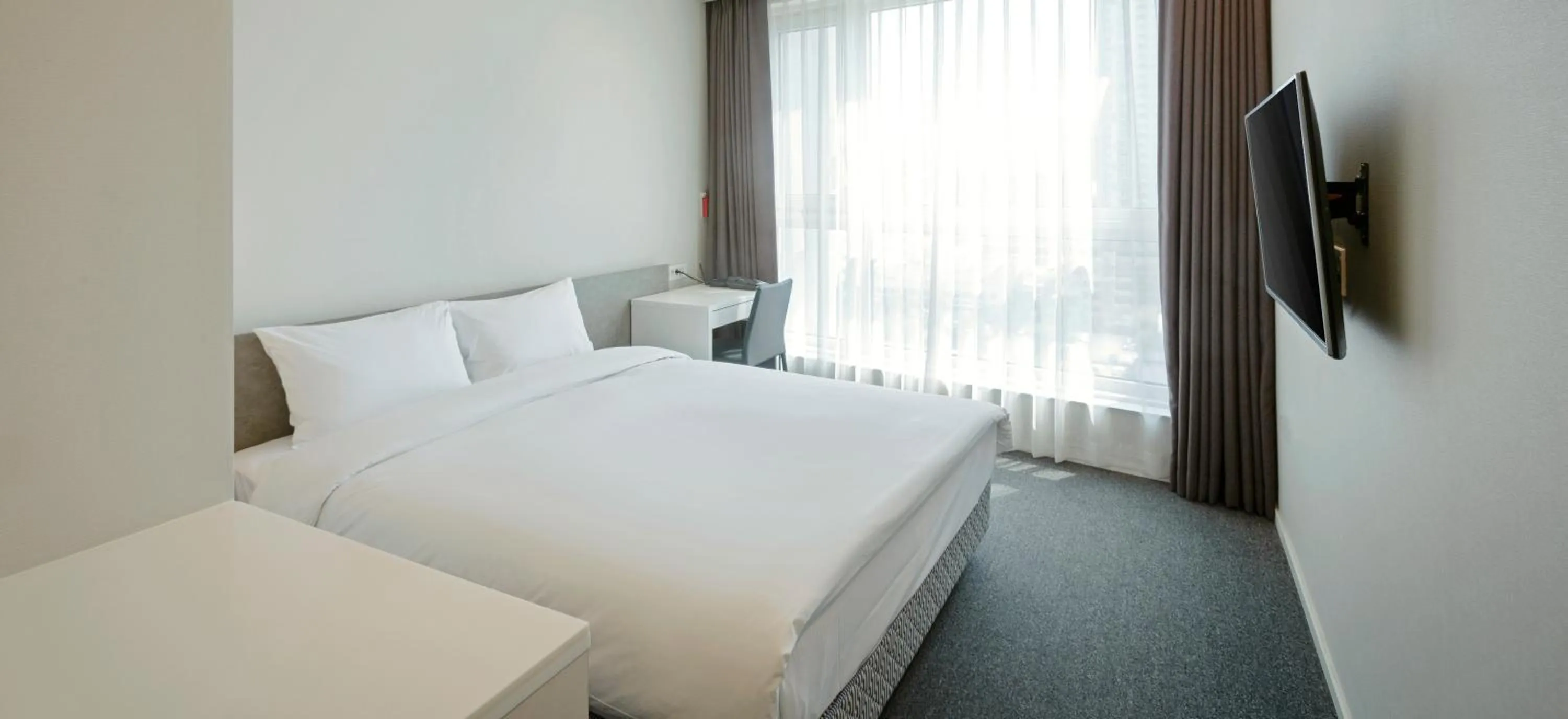 Bed in Grand City Hotel Changwon