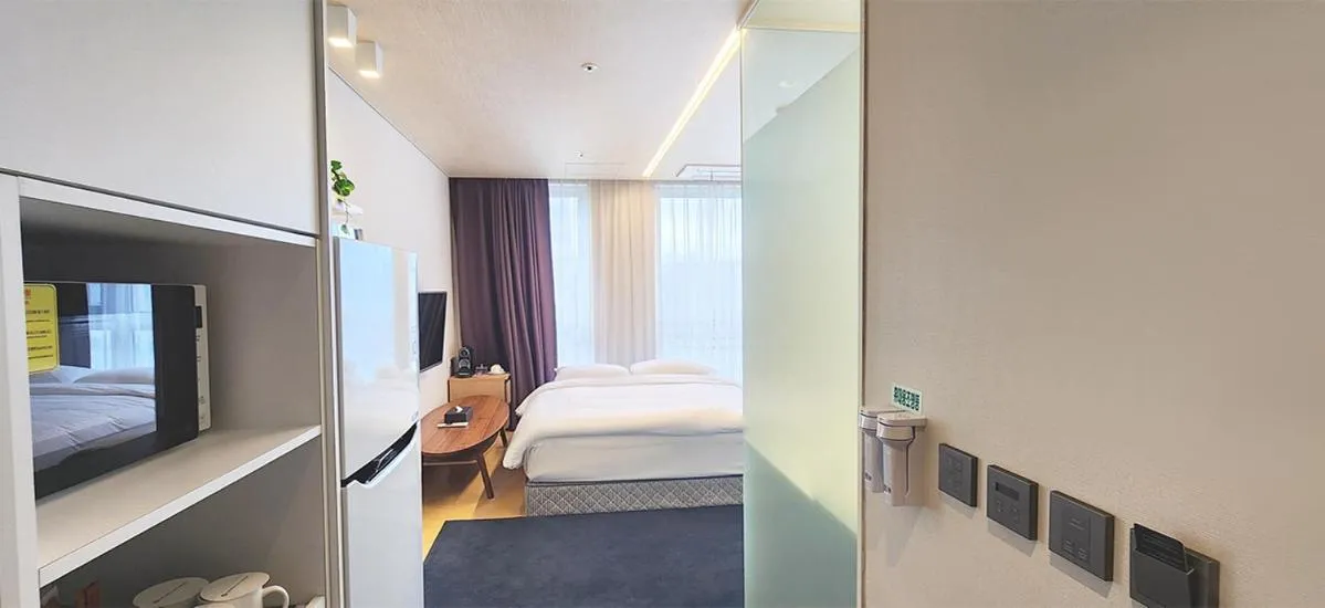 Bed in Grand City Hotel Changwon