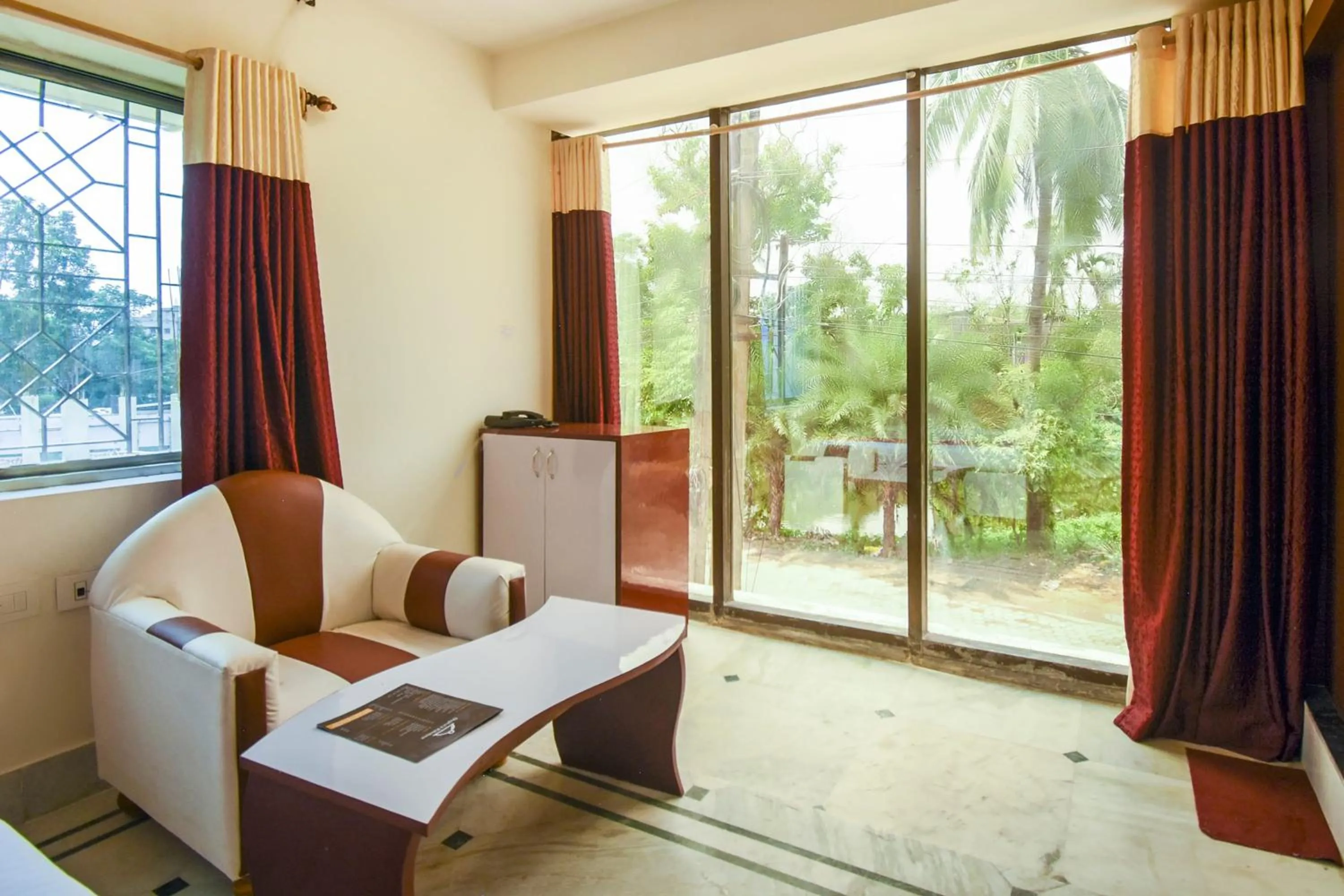 Bedroom in Super Hotel O Red Stone Near Netaji Subhash Chandra Bose International Airport