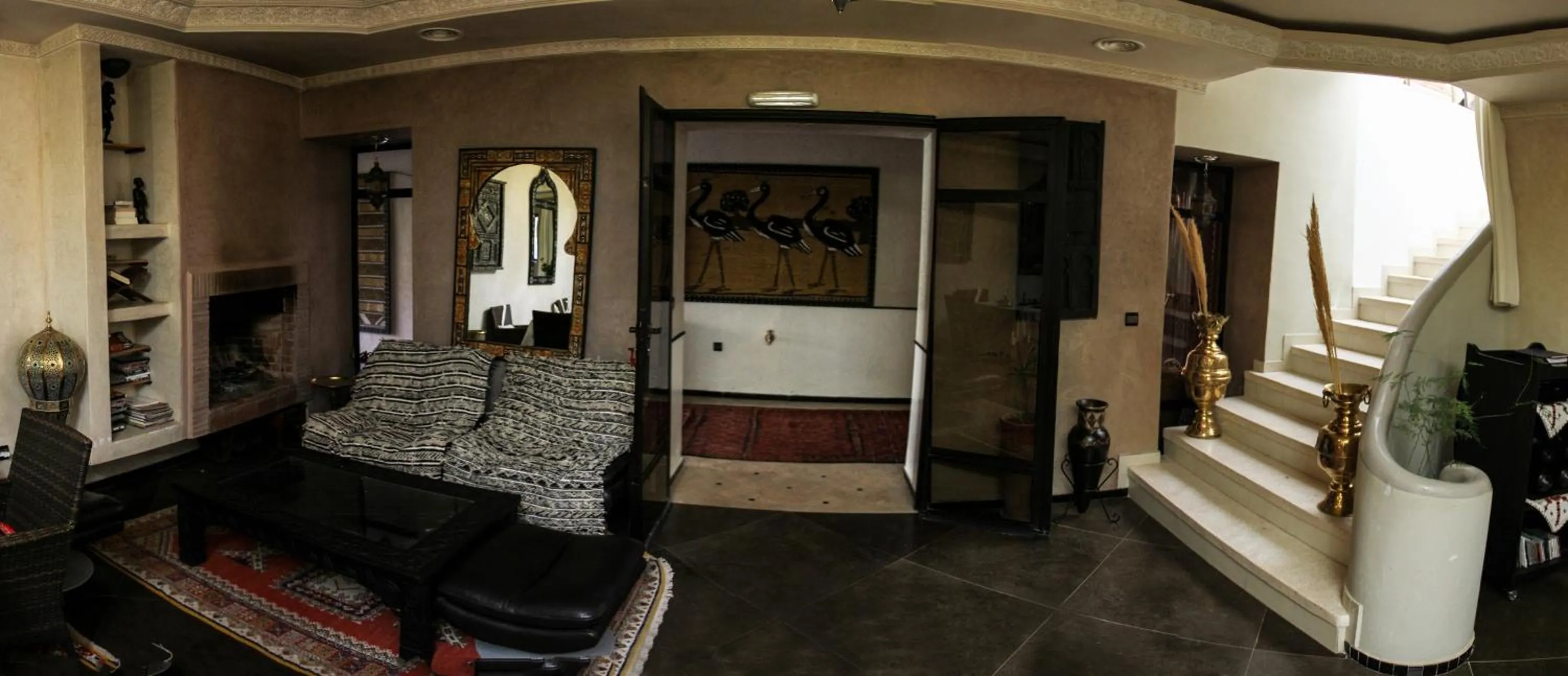 Communal lounge/ TV room in Riad Tama & spa