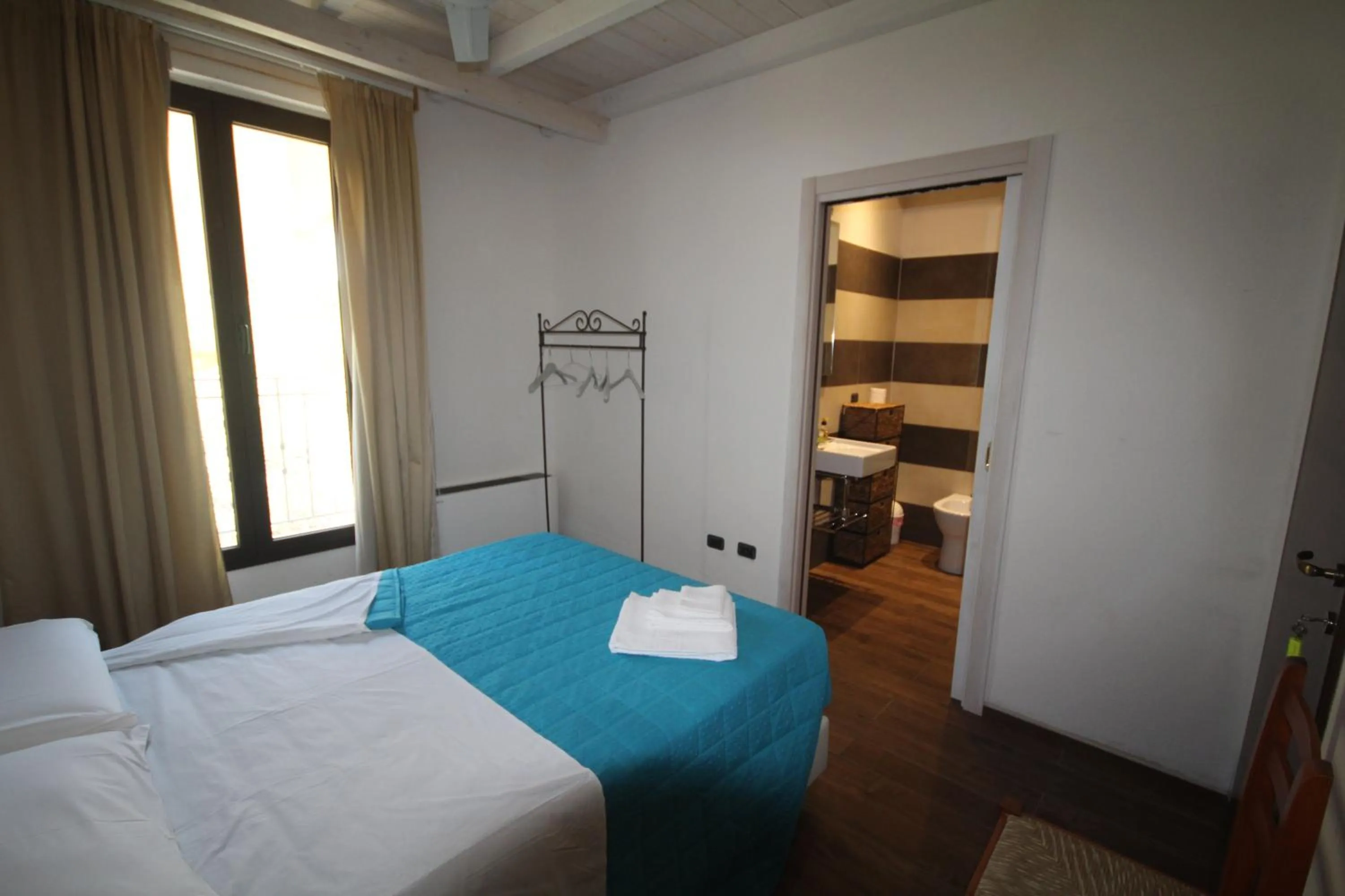 Bedroom, Bed in Villa La Conchiglia Rooms