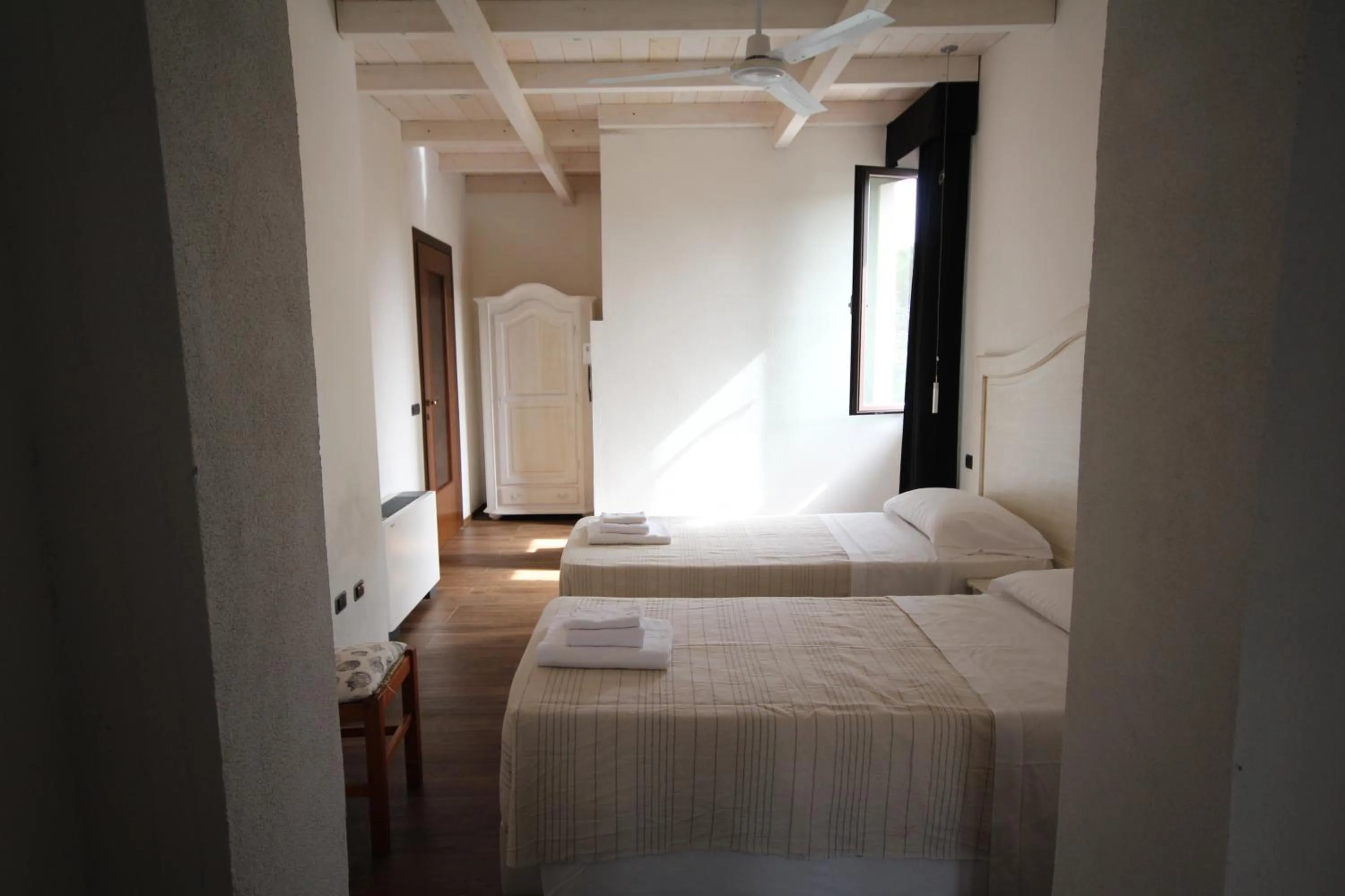Bed in Villa La Conchiglia Rooms