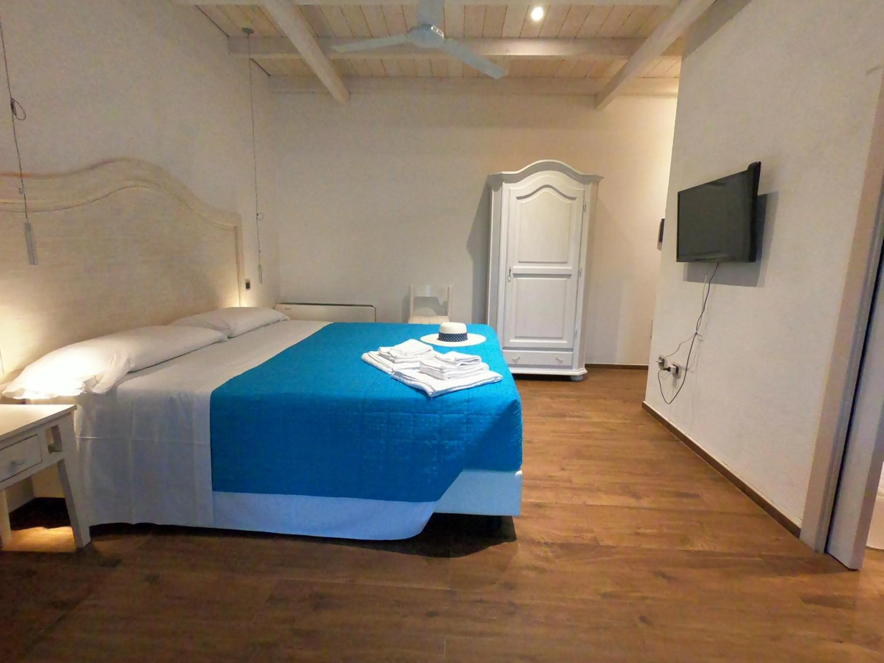 Bed in Villa La Conchiglia Rooms