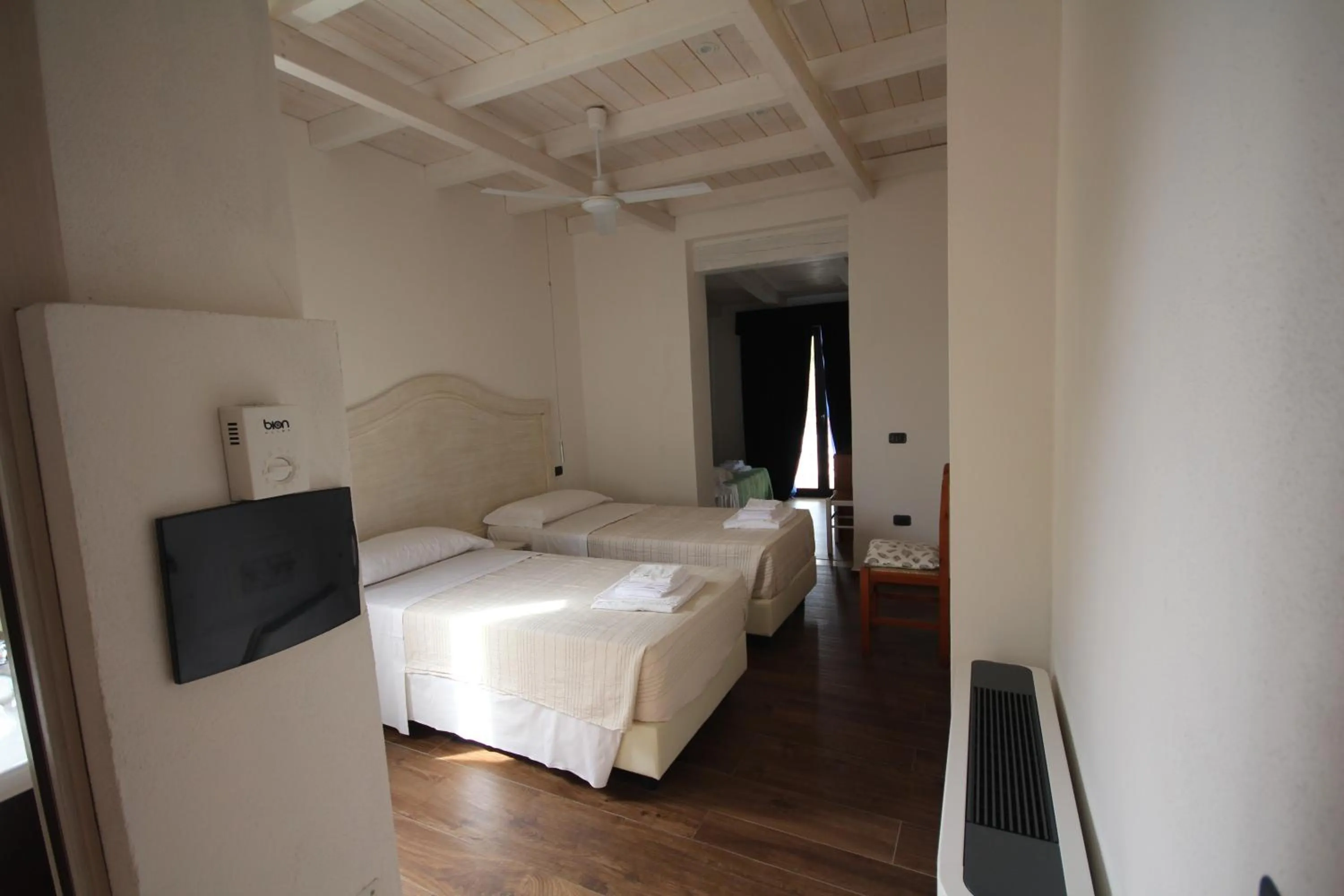 Bed in Villa La Conchiglia Rooms