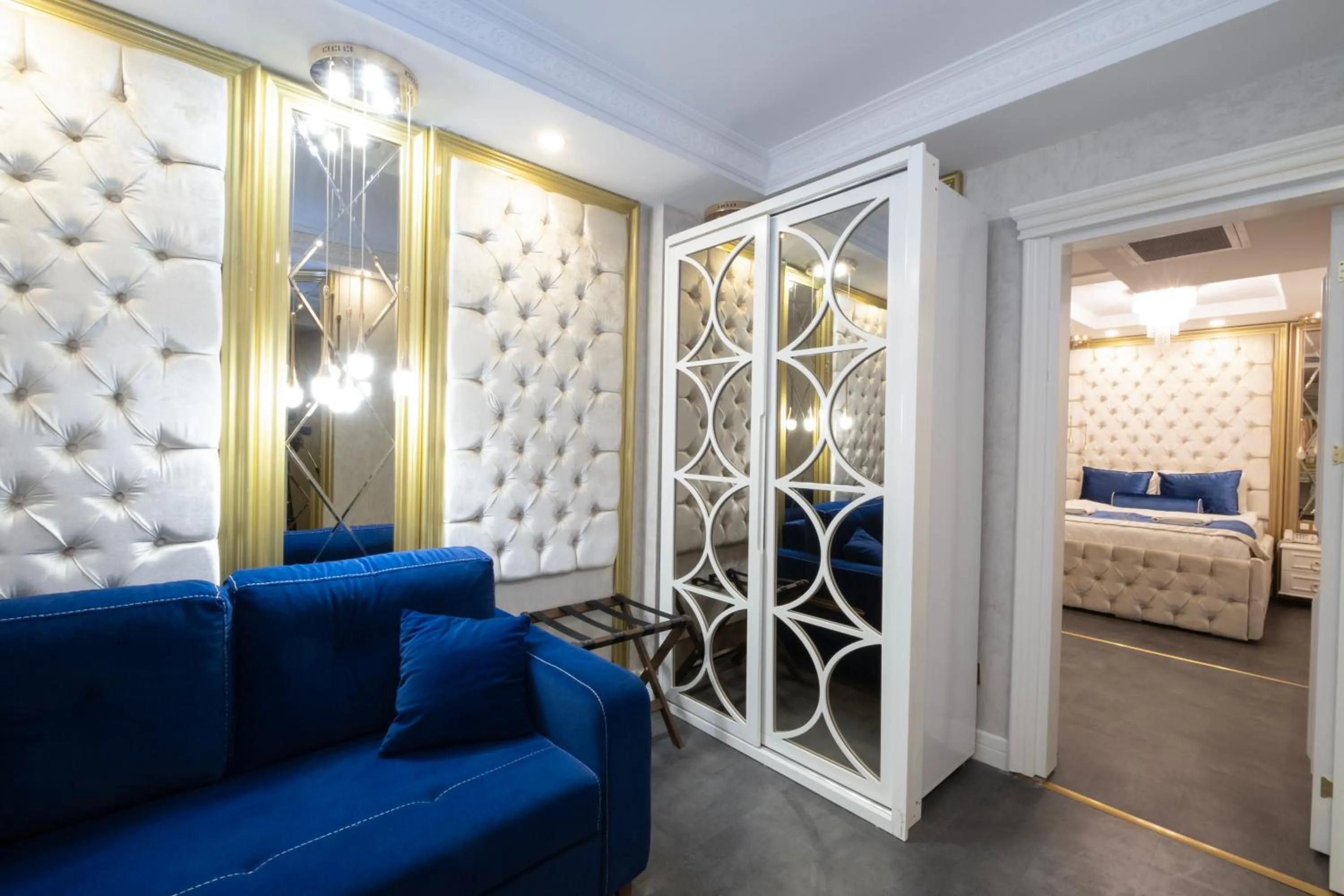 Bed in Leslion Luxury Hotel