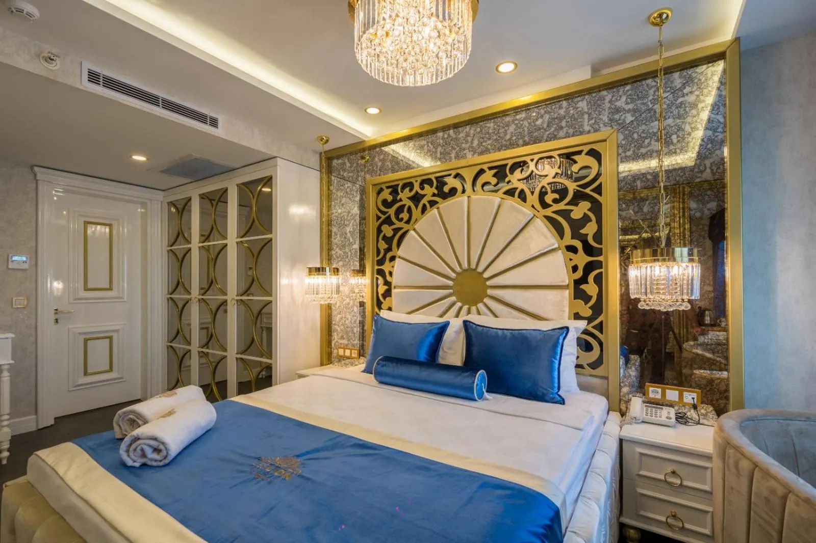 Bed in Leslion Luxury Hotel