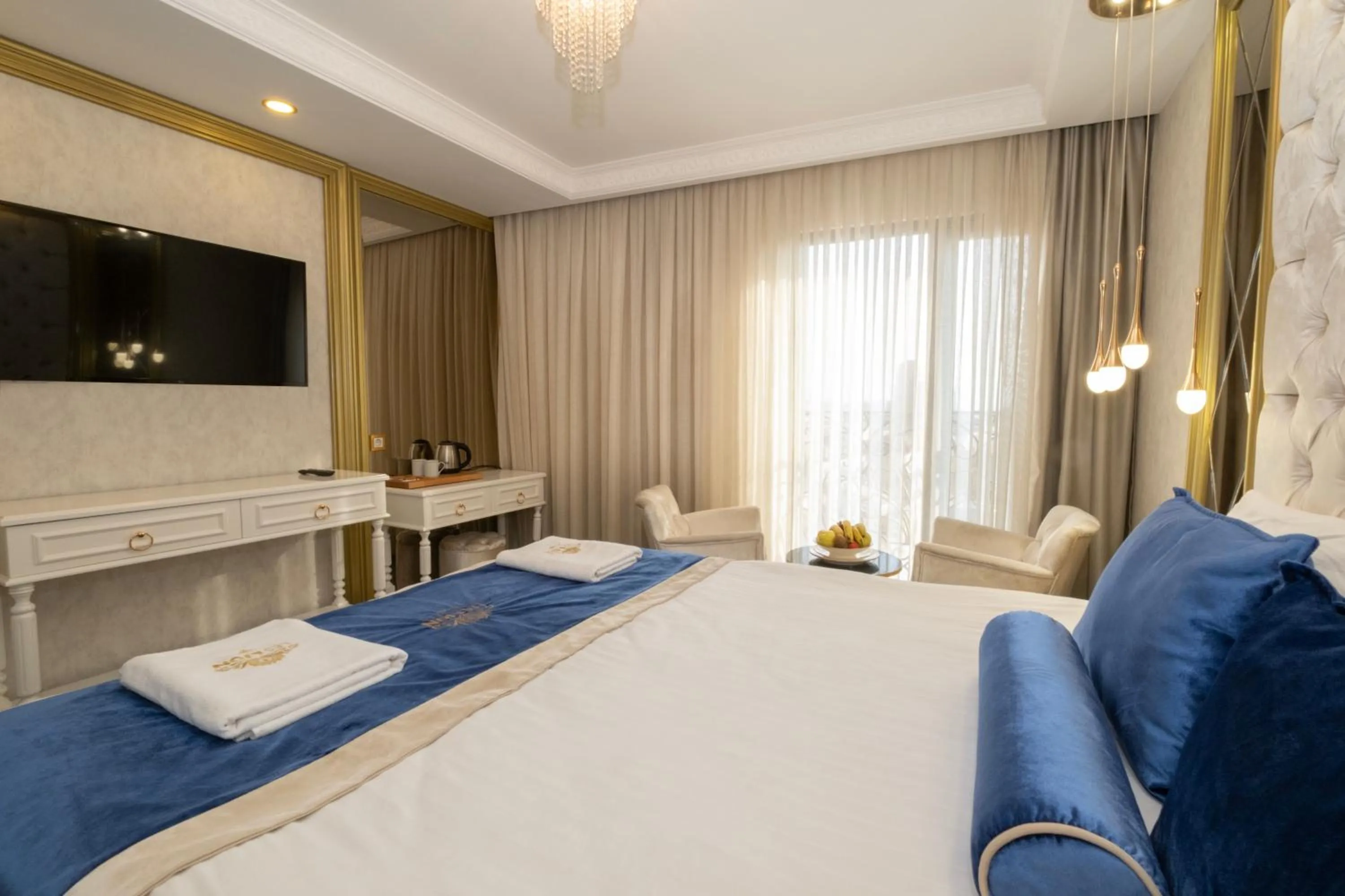 Bed in Leslion Luxury Hotel