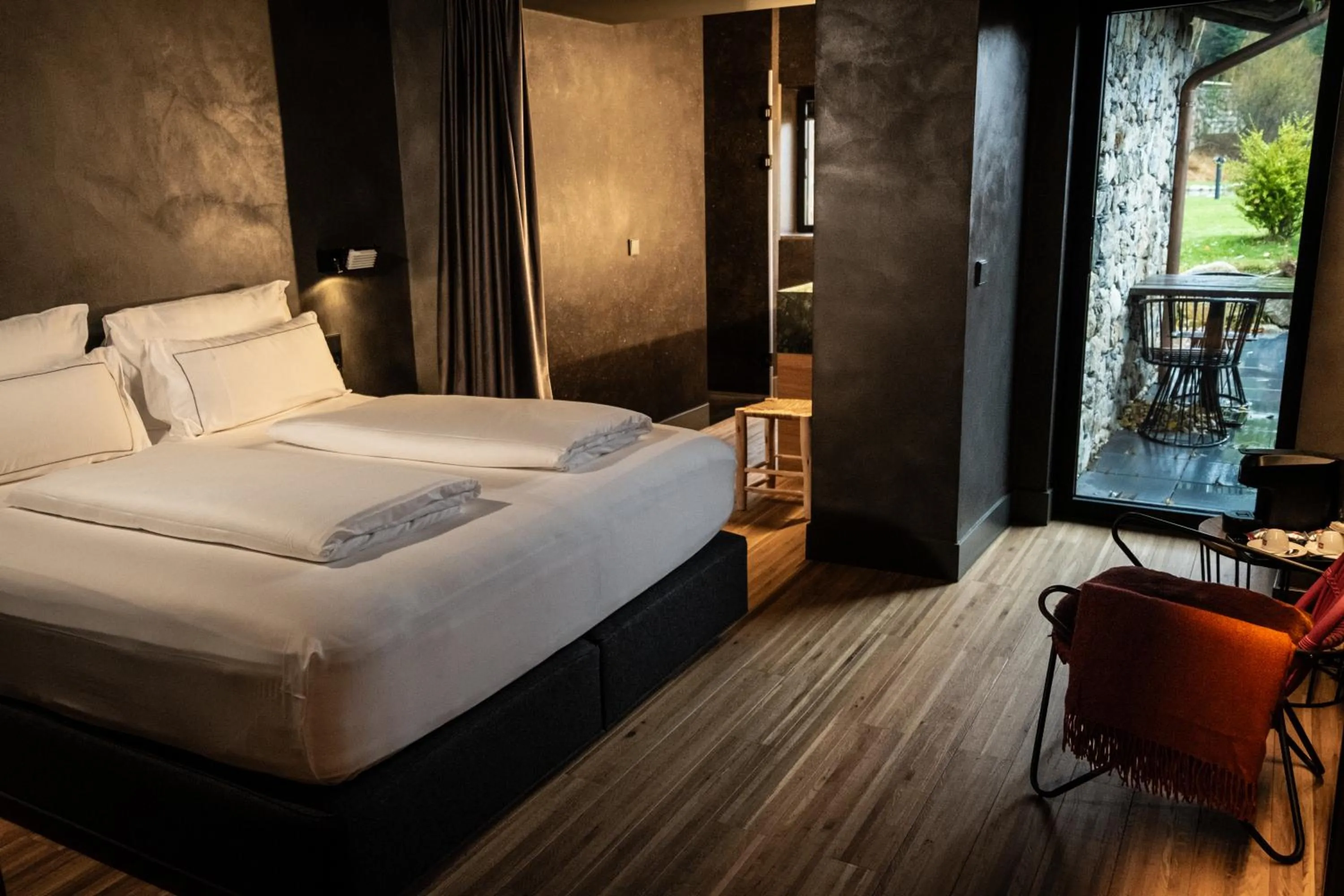 Bed in Les Pardines 1819 Mountain suites & SPA