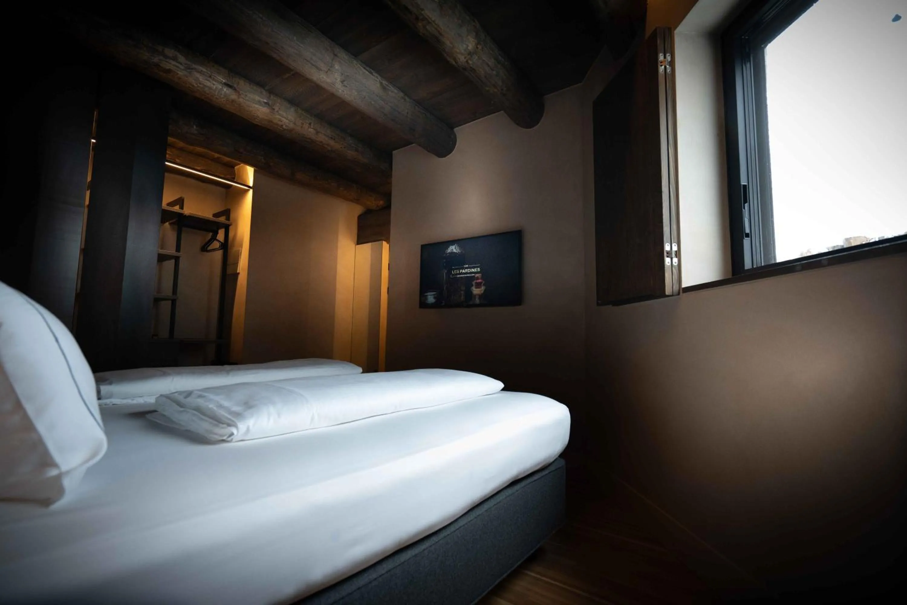 Bed in Les Pardines 1819 Mountain suites & SPA