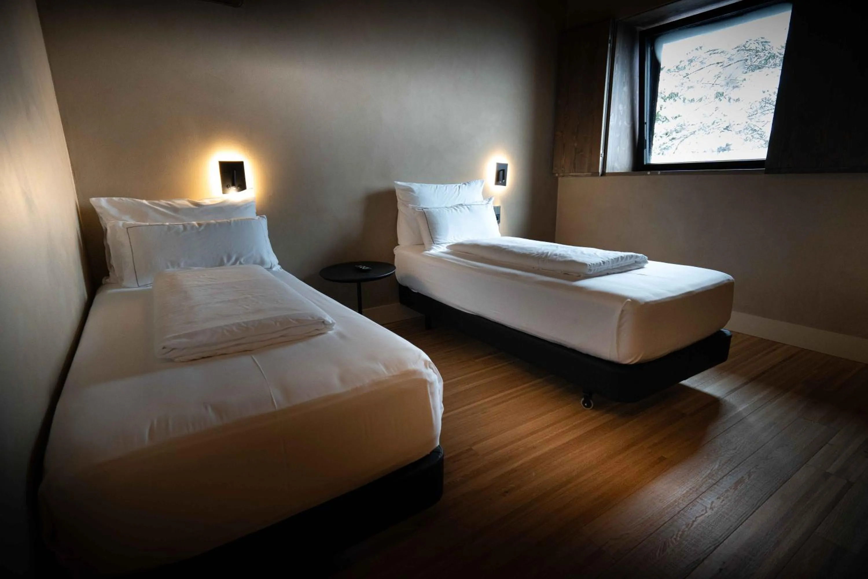 Bed in Les Pardines 1819 Mountain suites & SPA