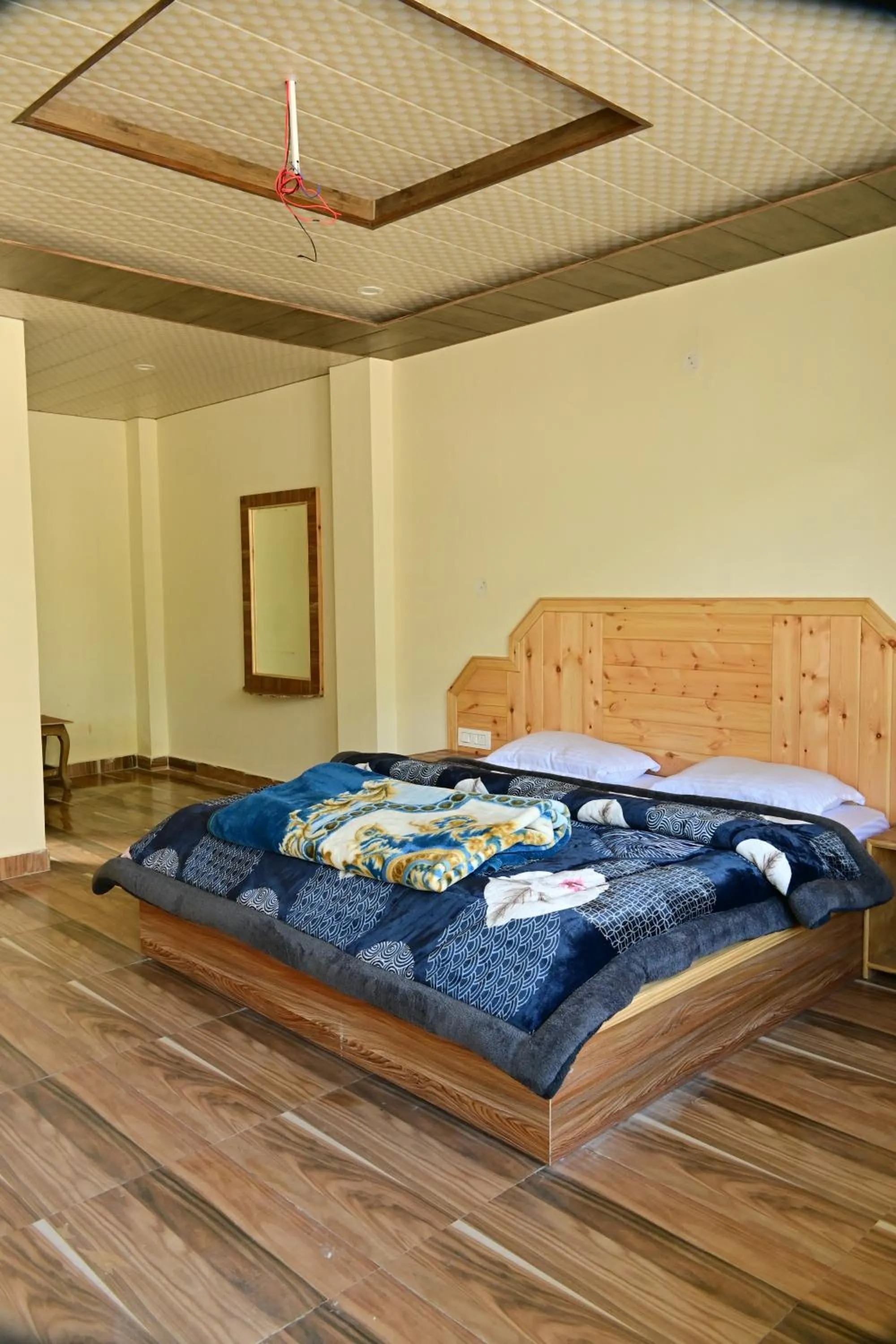 Bed in Nomadic Den Manali