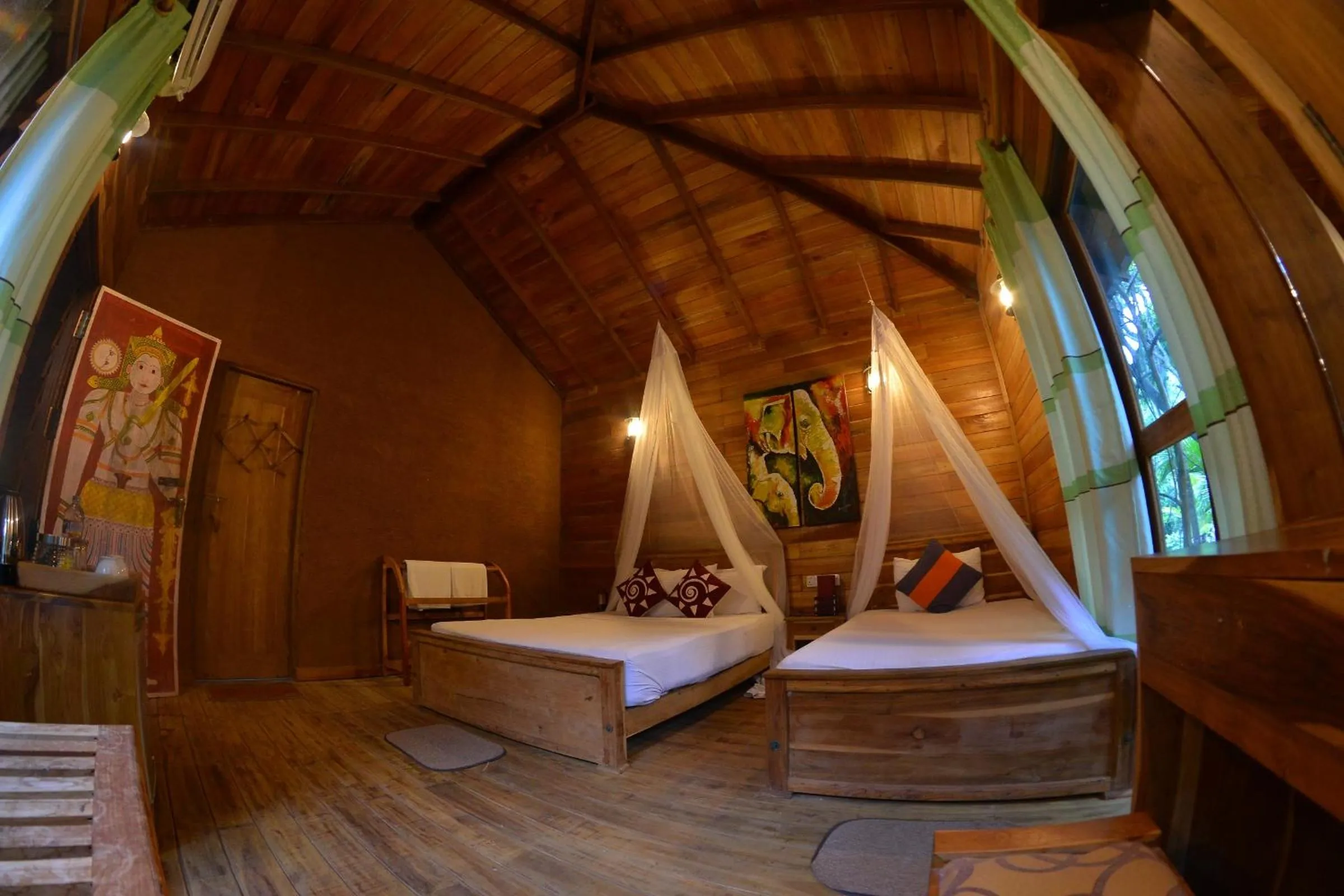 Photo of the whole room, Bed in Habarana Tree house Mutu village