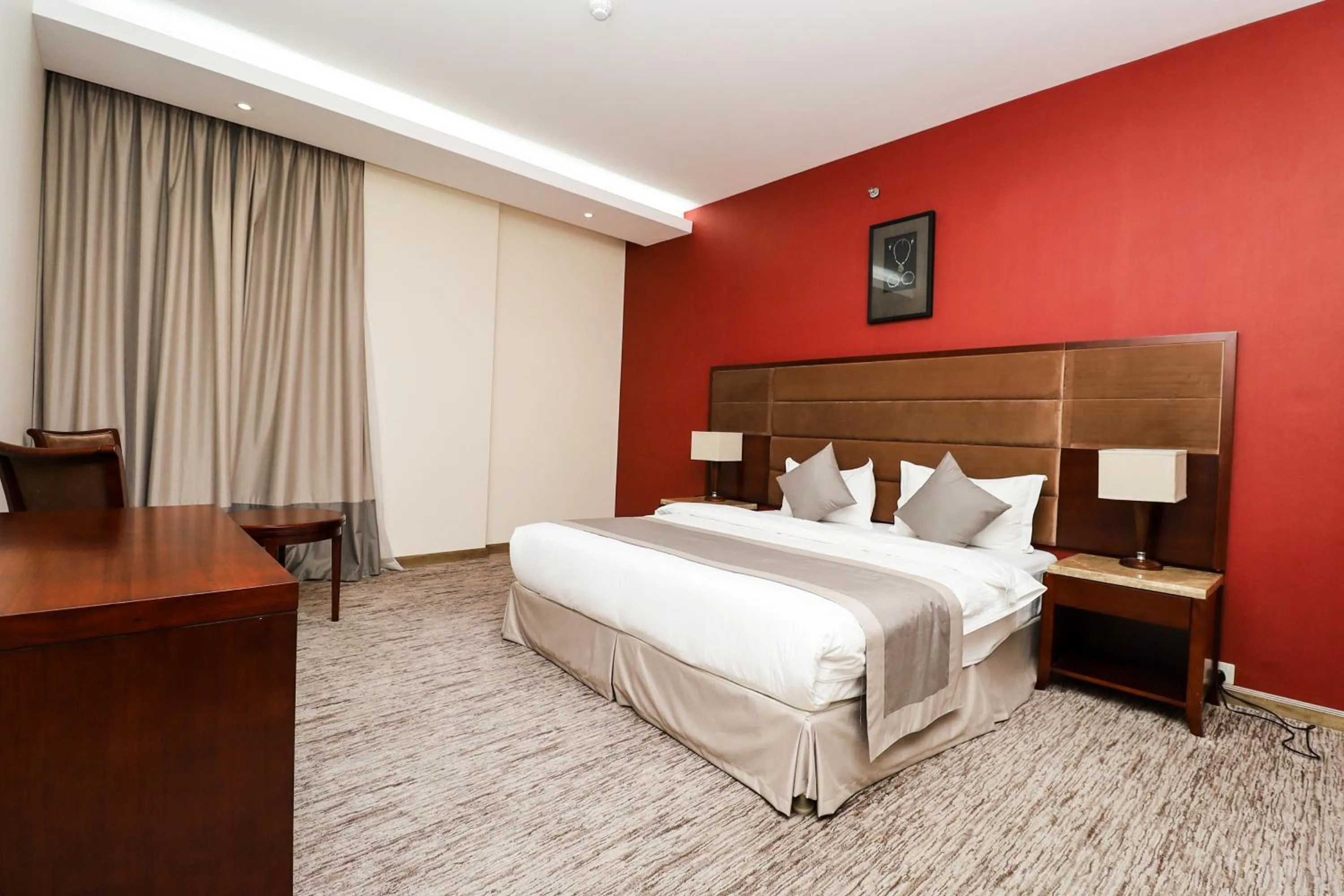 Bed in شقق مسكن المدينة للشقق المخدومة