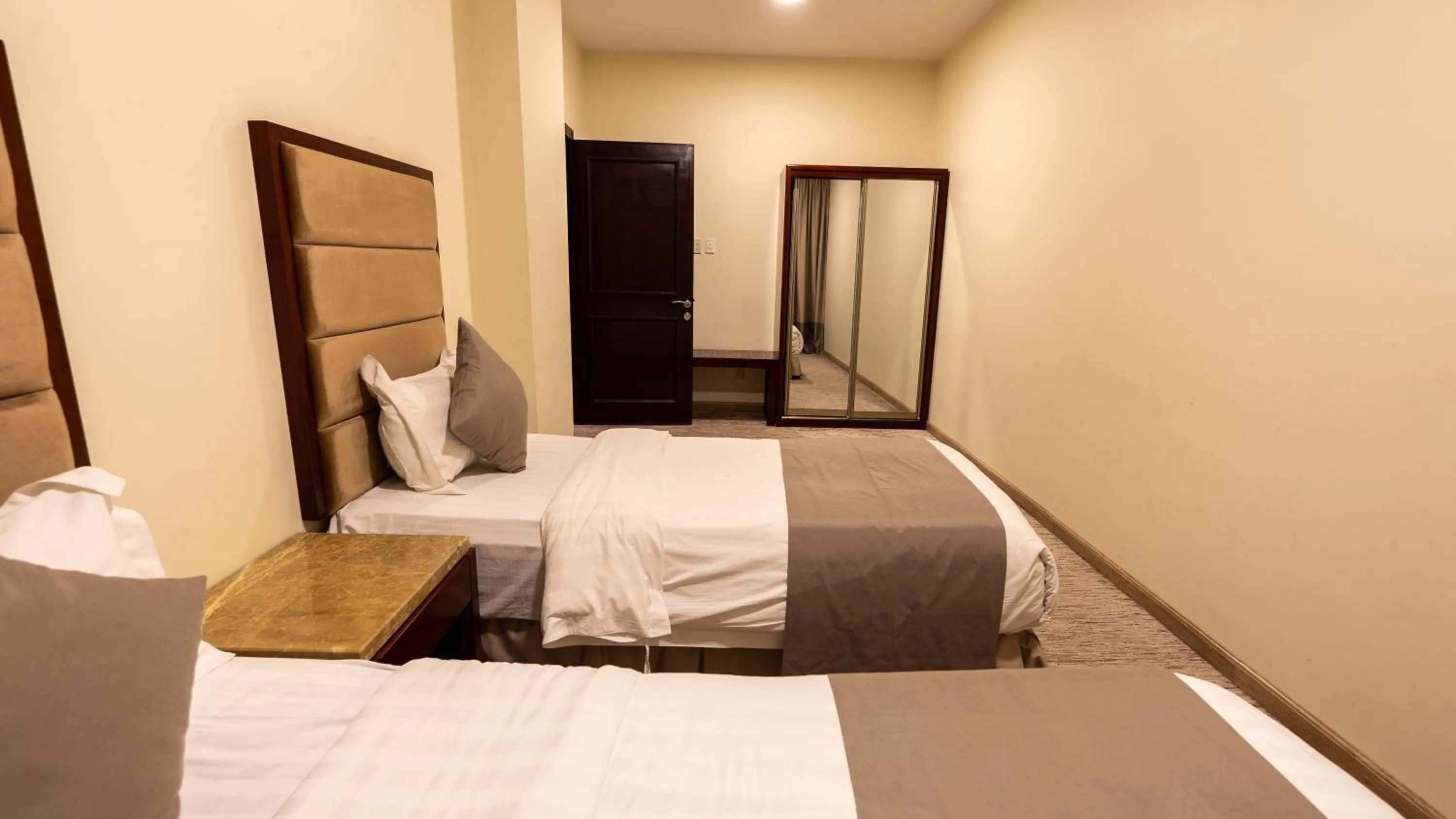 Bed in شقق مسكن المدينة للشقق المخدومة