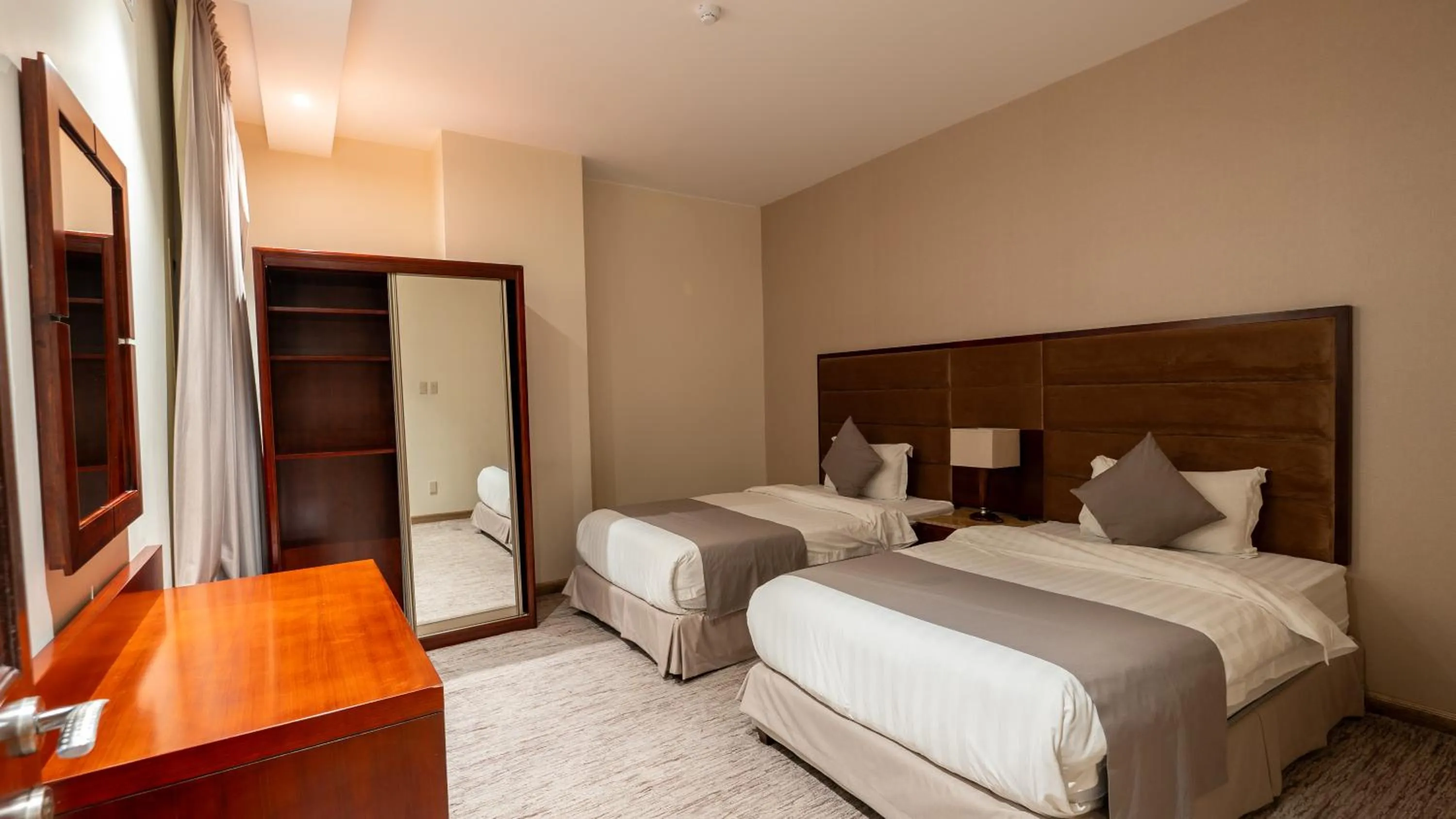 Bed in شقق مسكن المدينة للشقق المخدومة