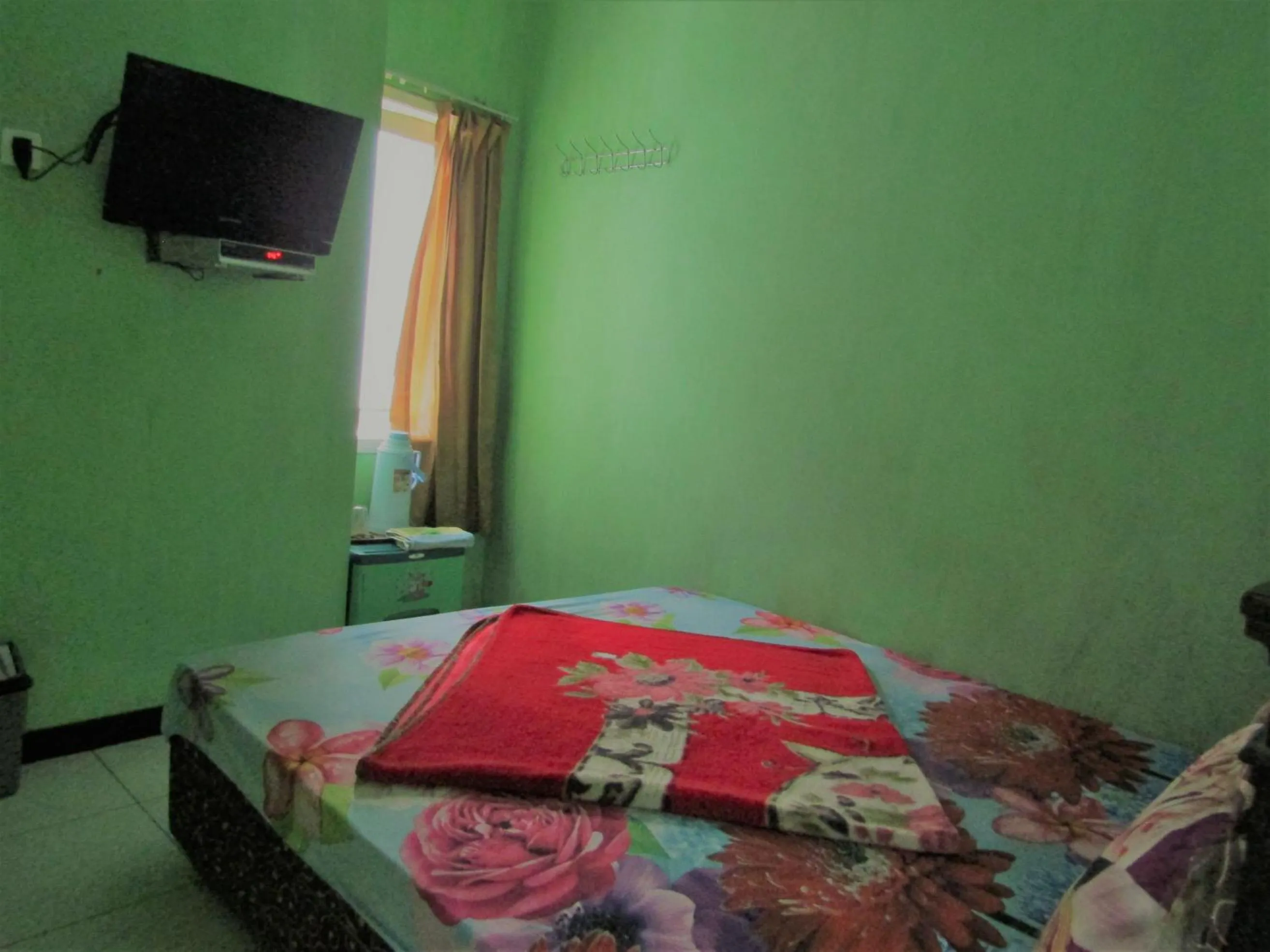 Photo of the whole room, Bed in Hotel Nirmala