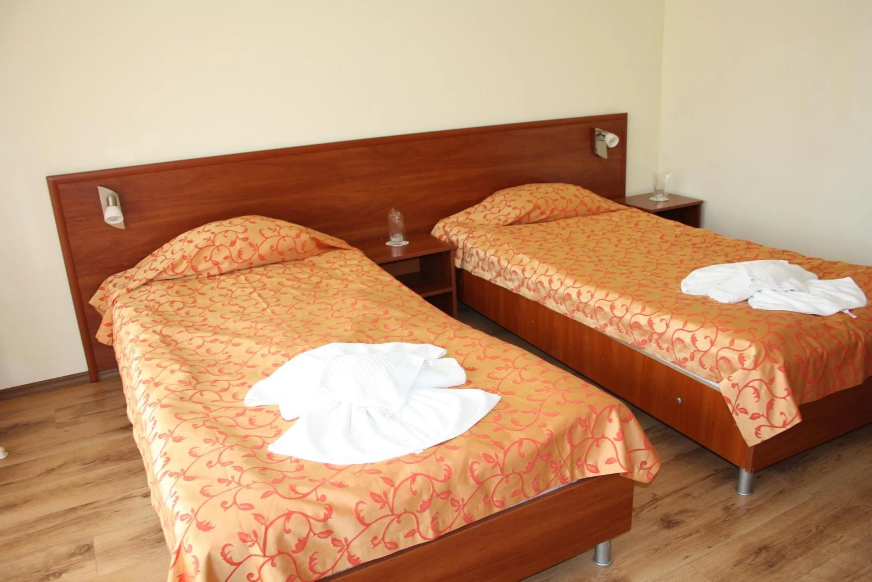 Bed in Iris Beach Hotel